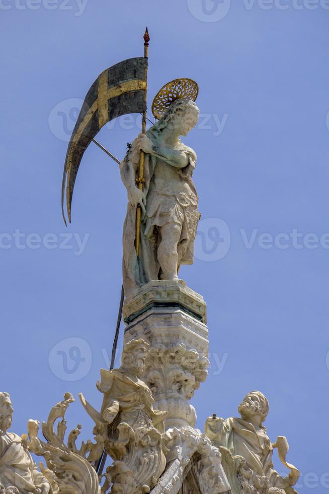 Architectural details from the upper part of facade of San Marco in Venice, Italy photo