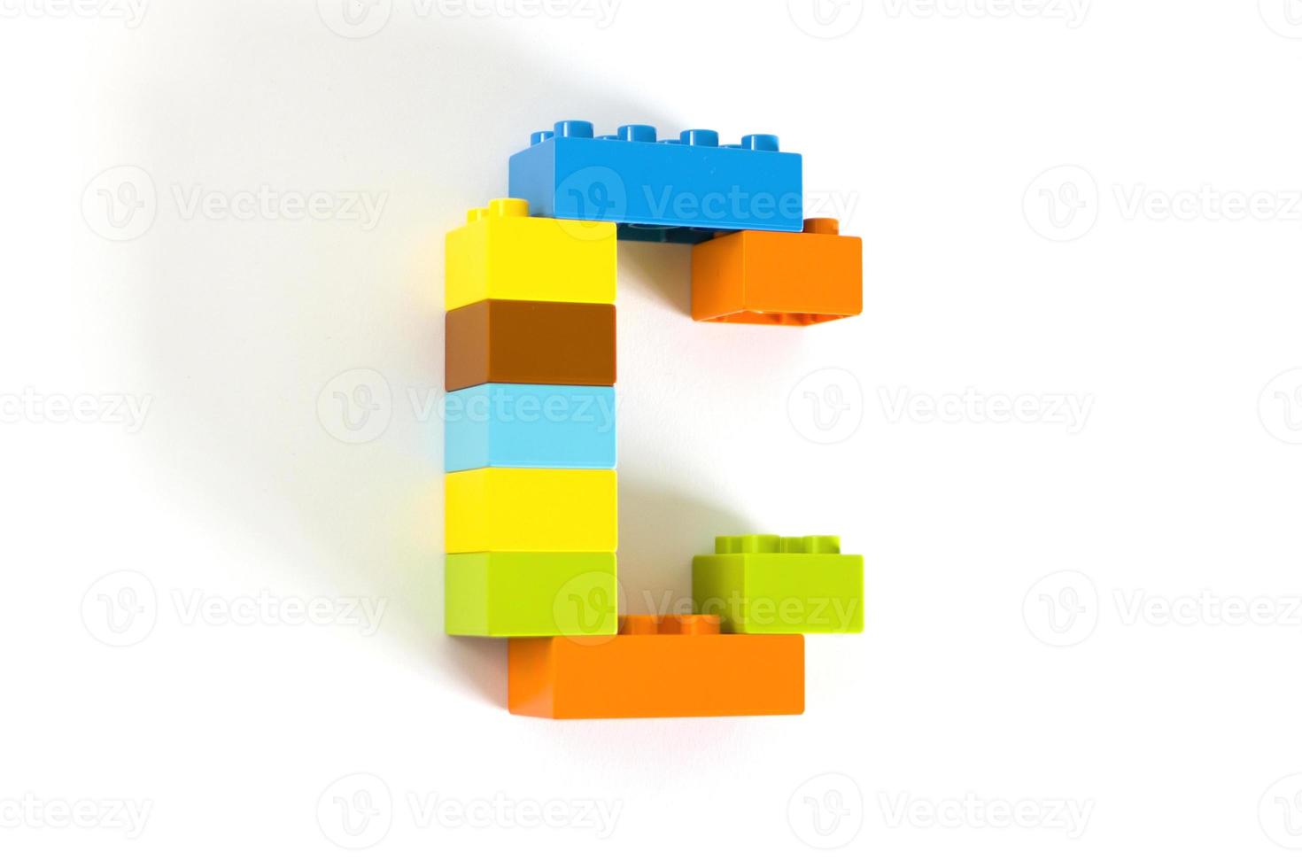 Colorful toy brick letter C photo