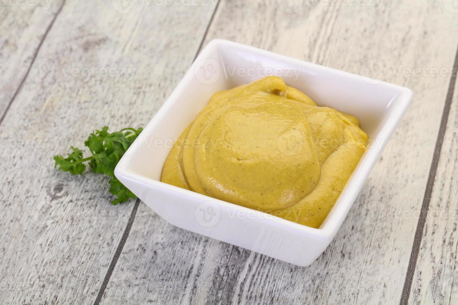 Mustard sauce in the bowl photo