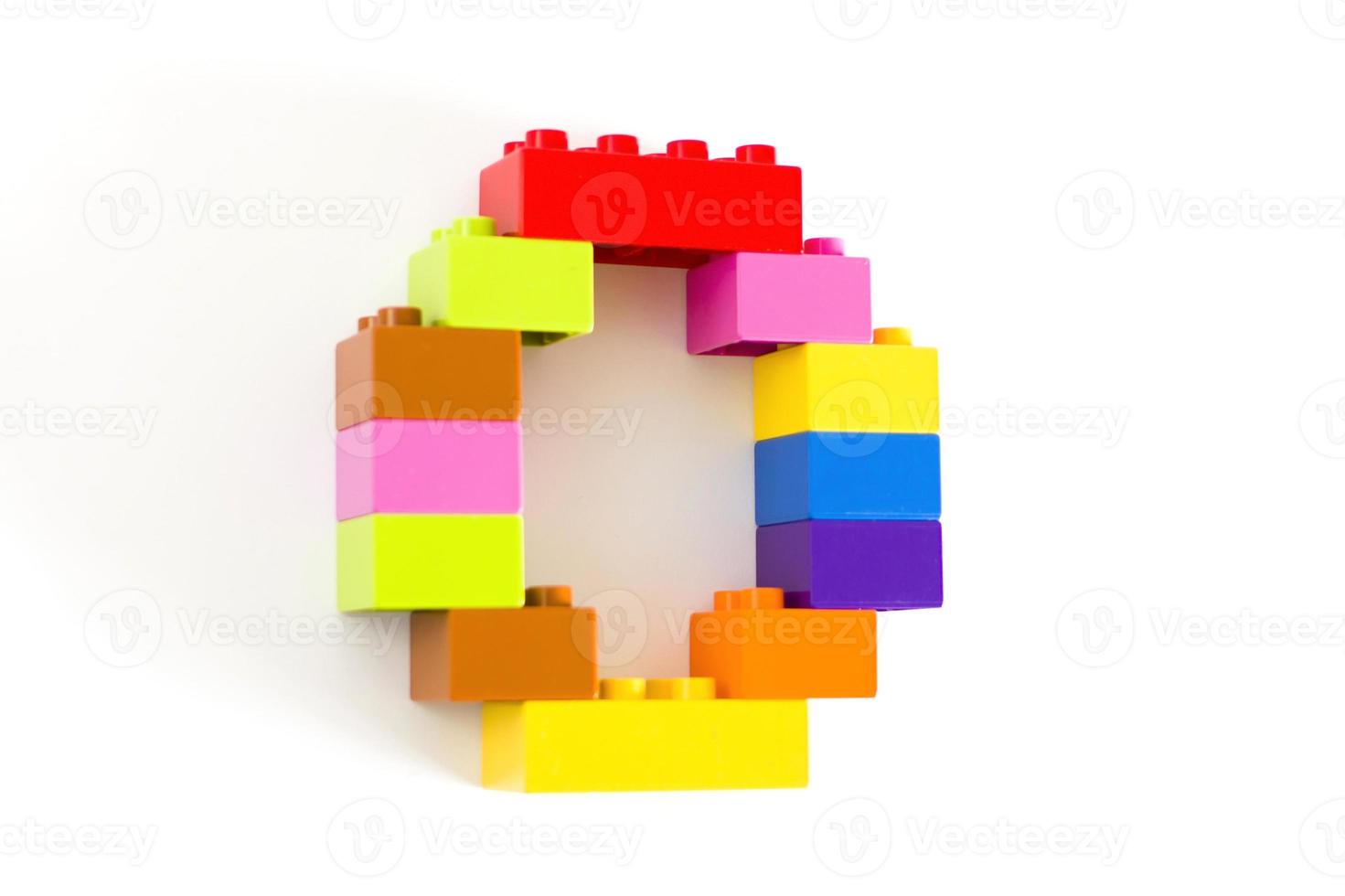 Colorful toy brick letter O photo