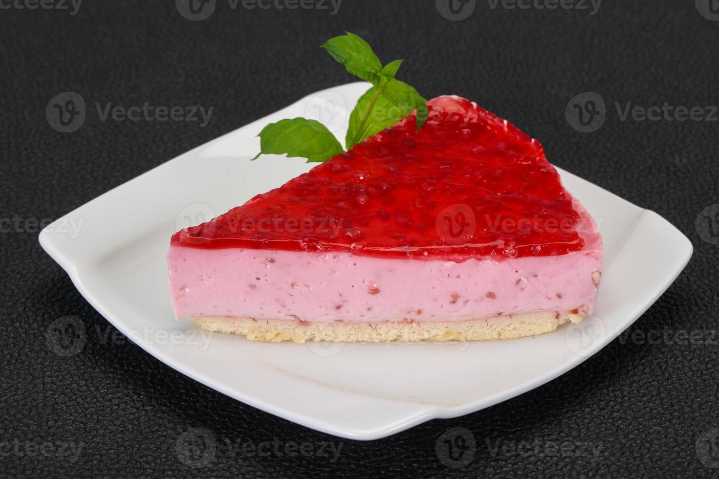 Soft Raspberry cheesecake served mint photo