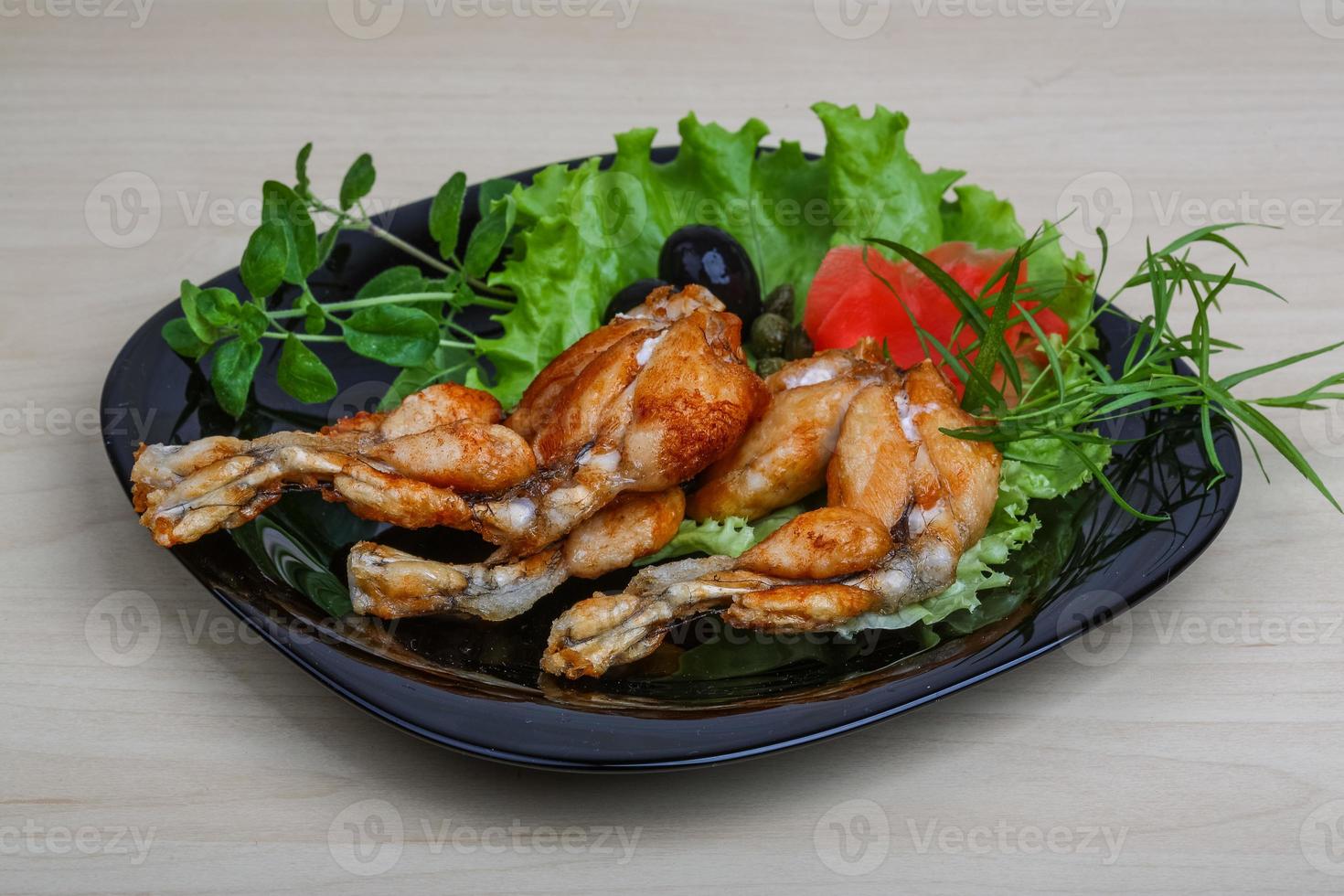 Fried frog legs photo