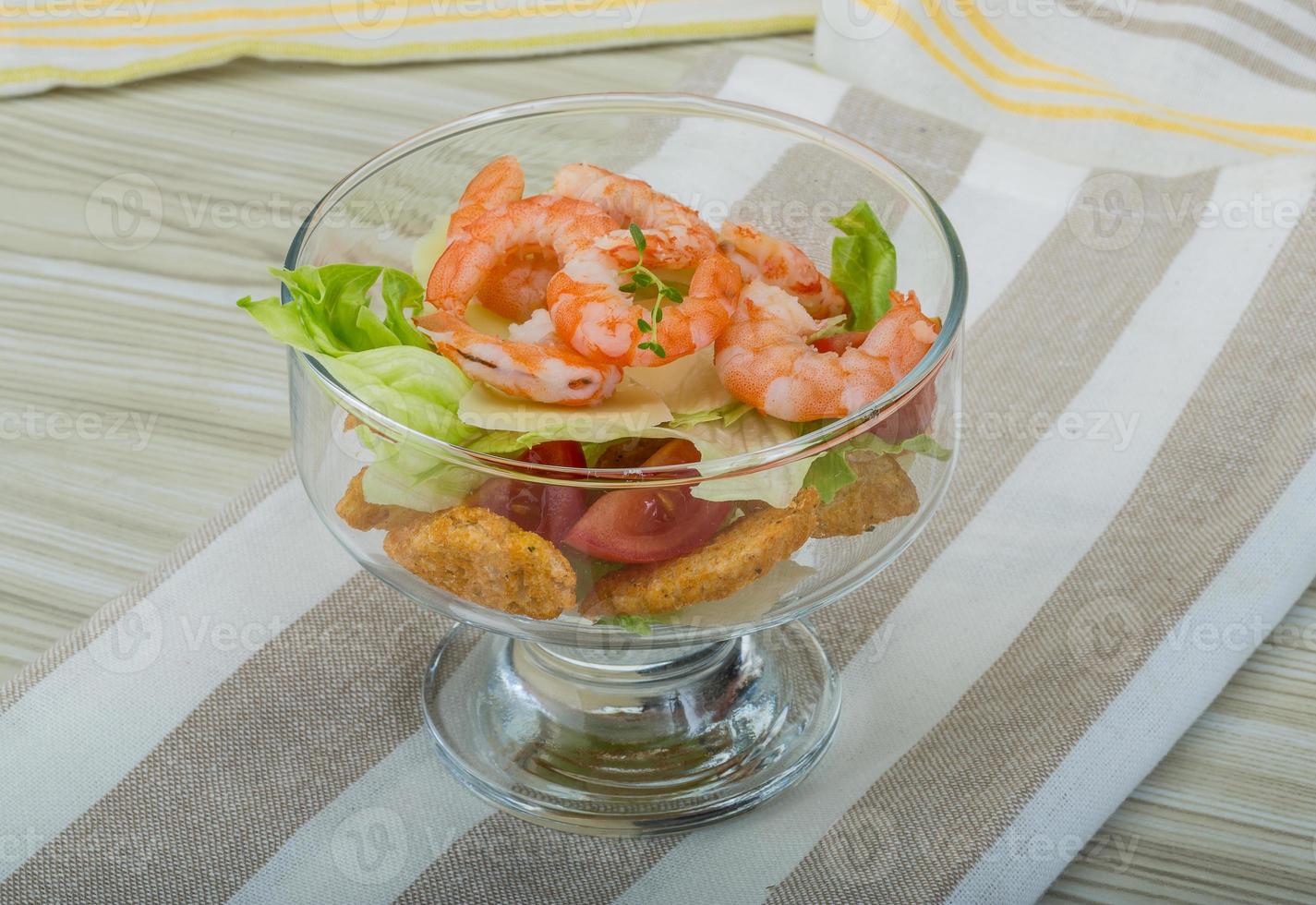 Caesar salad with shrimps photo
