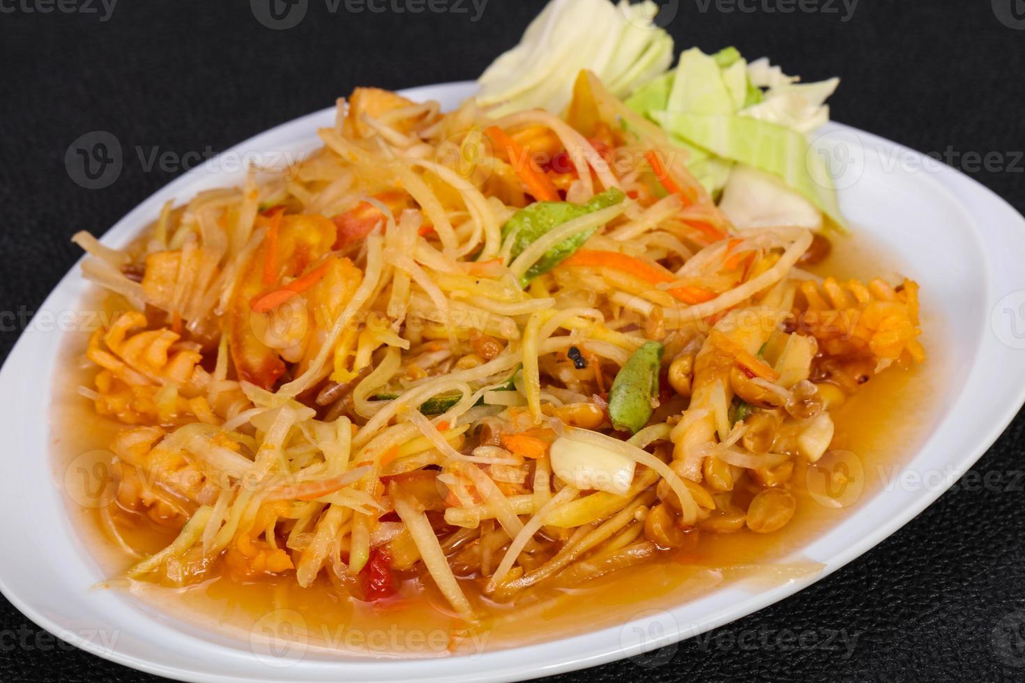 Thai salad with papaya and prawn photo