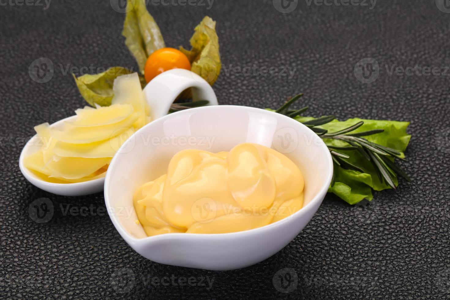 Cheese sauce in the bowl photo