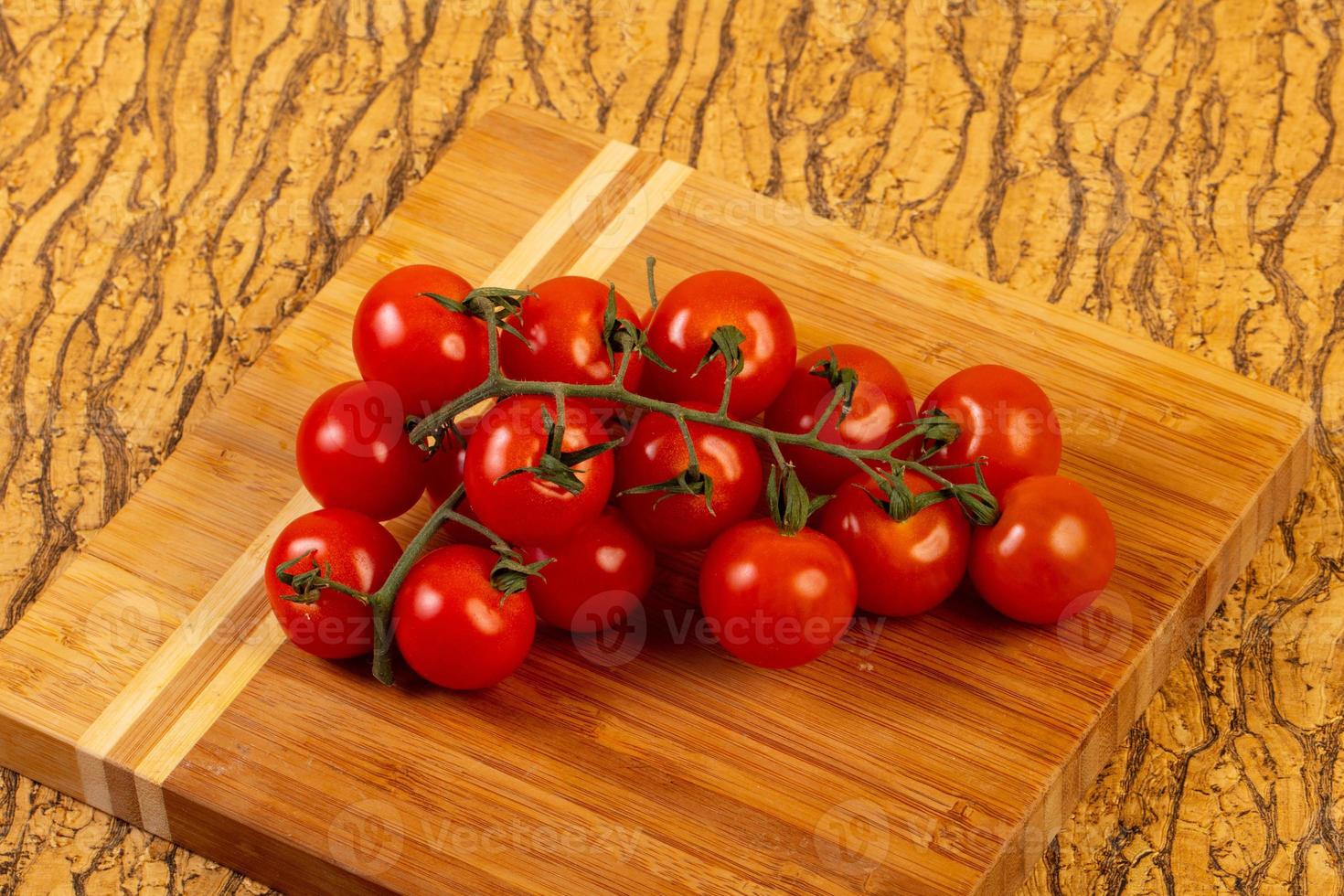 Ripe tomato branch photo