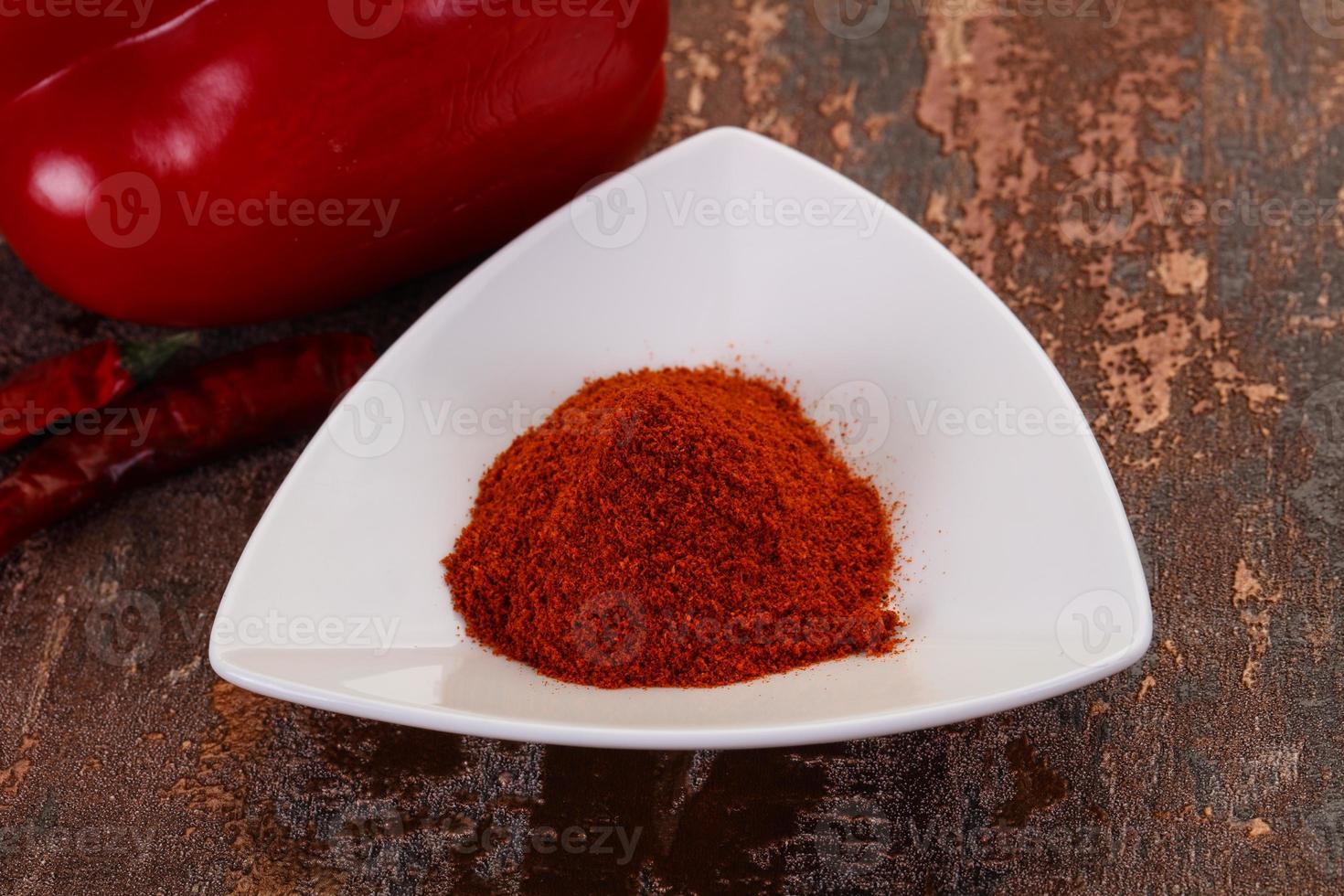 Paprika powder in the bowl photo