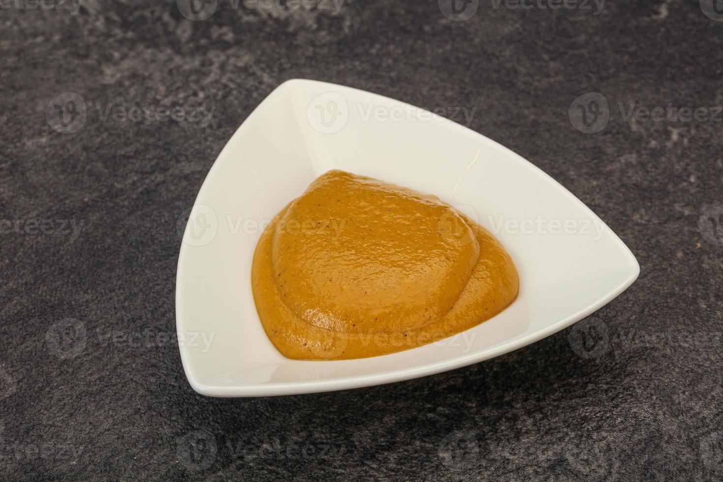 Mustard sauce in the bowl photo