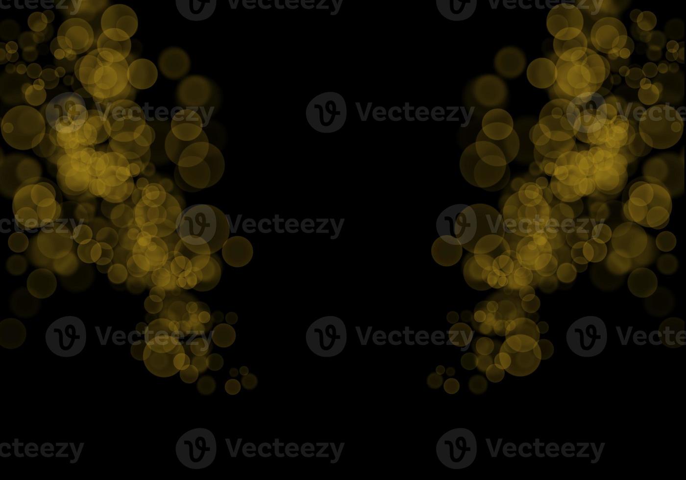 Golden yellow bokeh background  There is a sparkle of lights, Christmas and New Year party ideas. photo