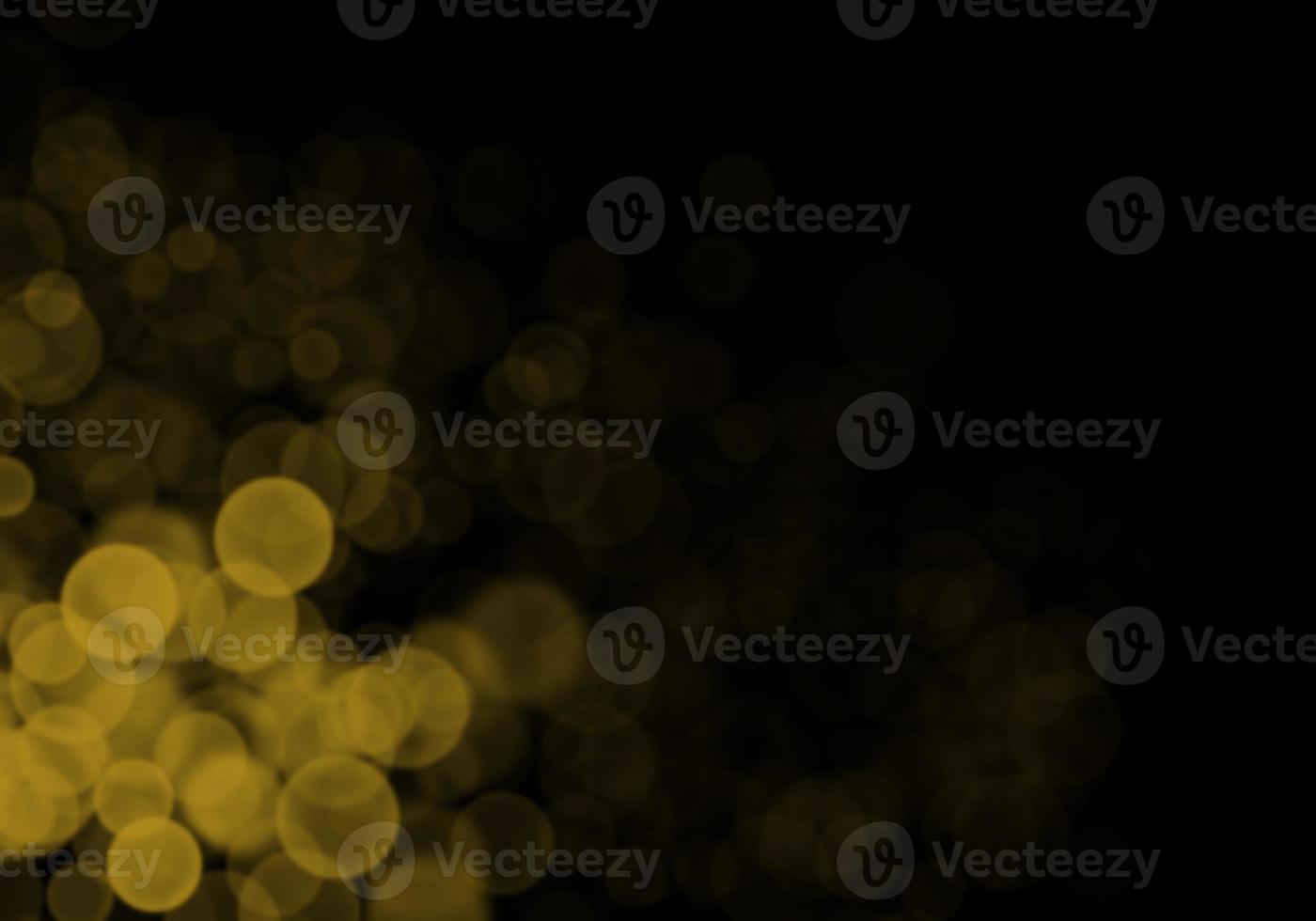 Golden yellow bokeh background  There is a sparkle of lights, Christmas and New Year party ideas. photo
