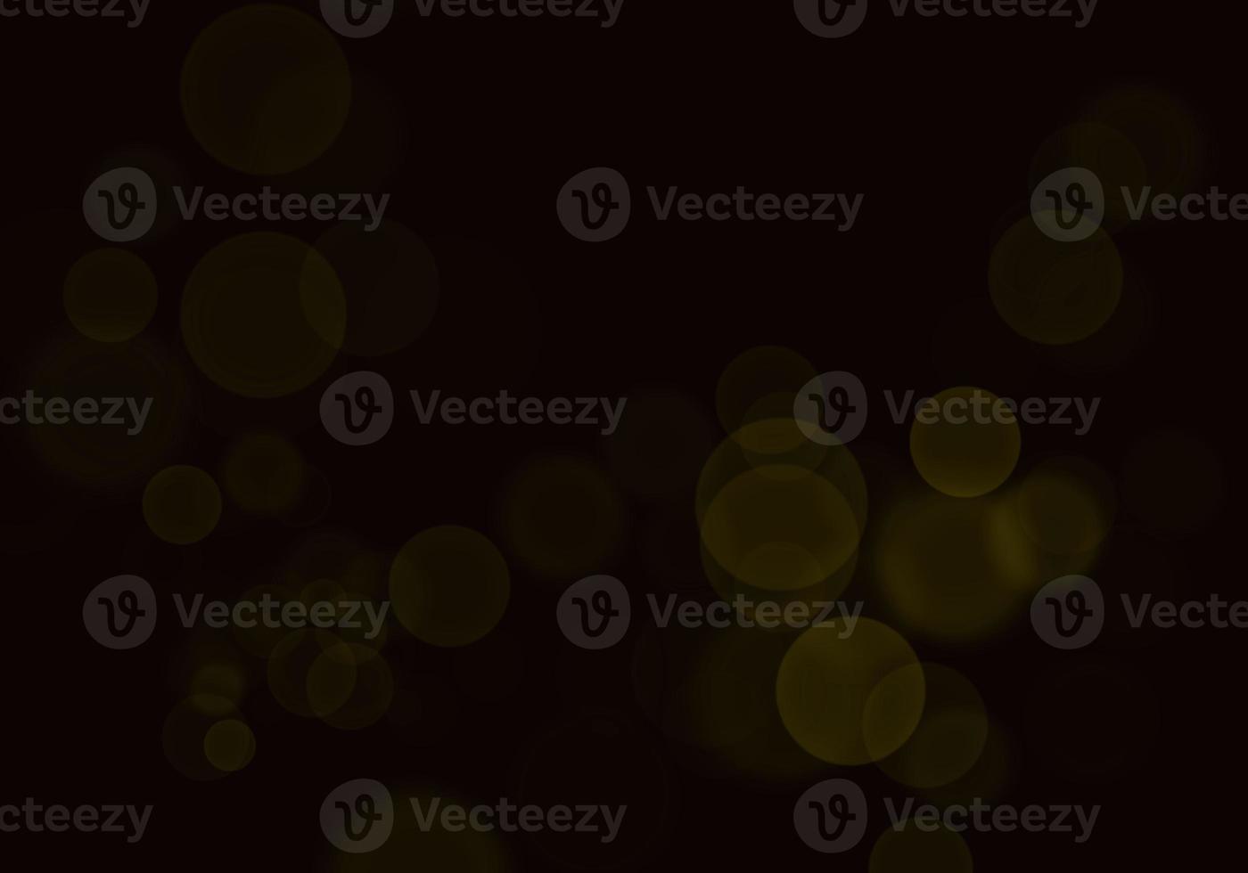 Golden yellow bokeh background  There is a sparkle of lights, Christmas and New Year party ideas. photo