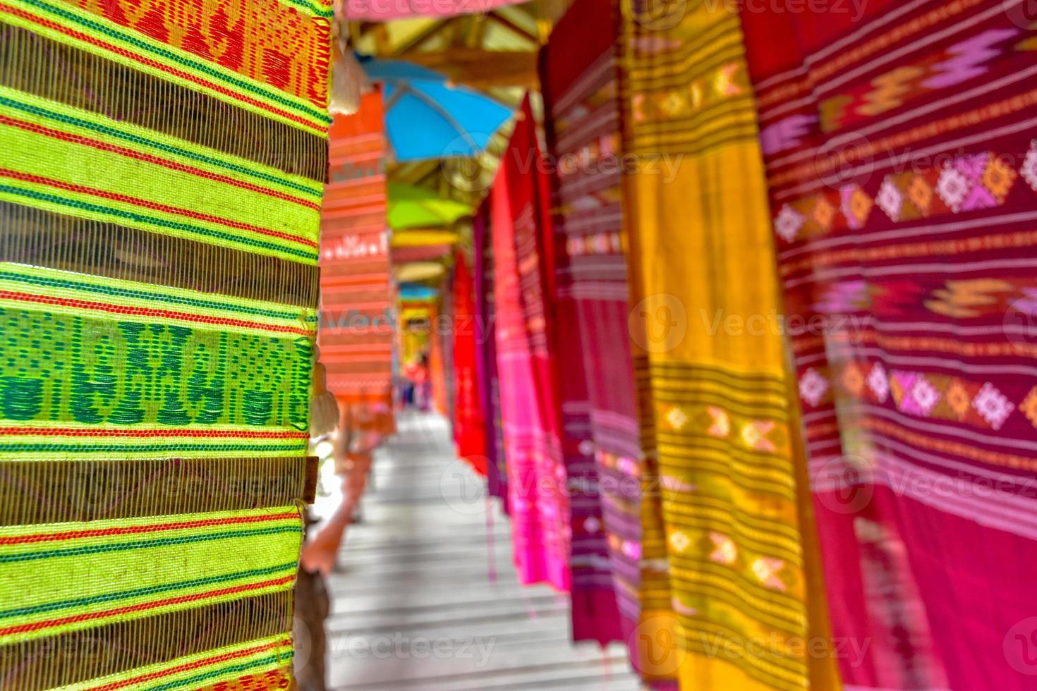 Traditional colorful Lanna fabric long flag use for decoration. photo