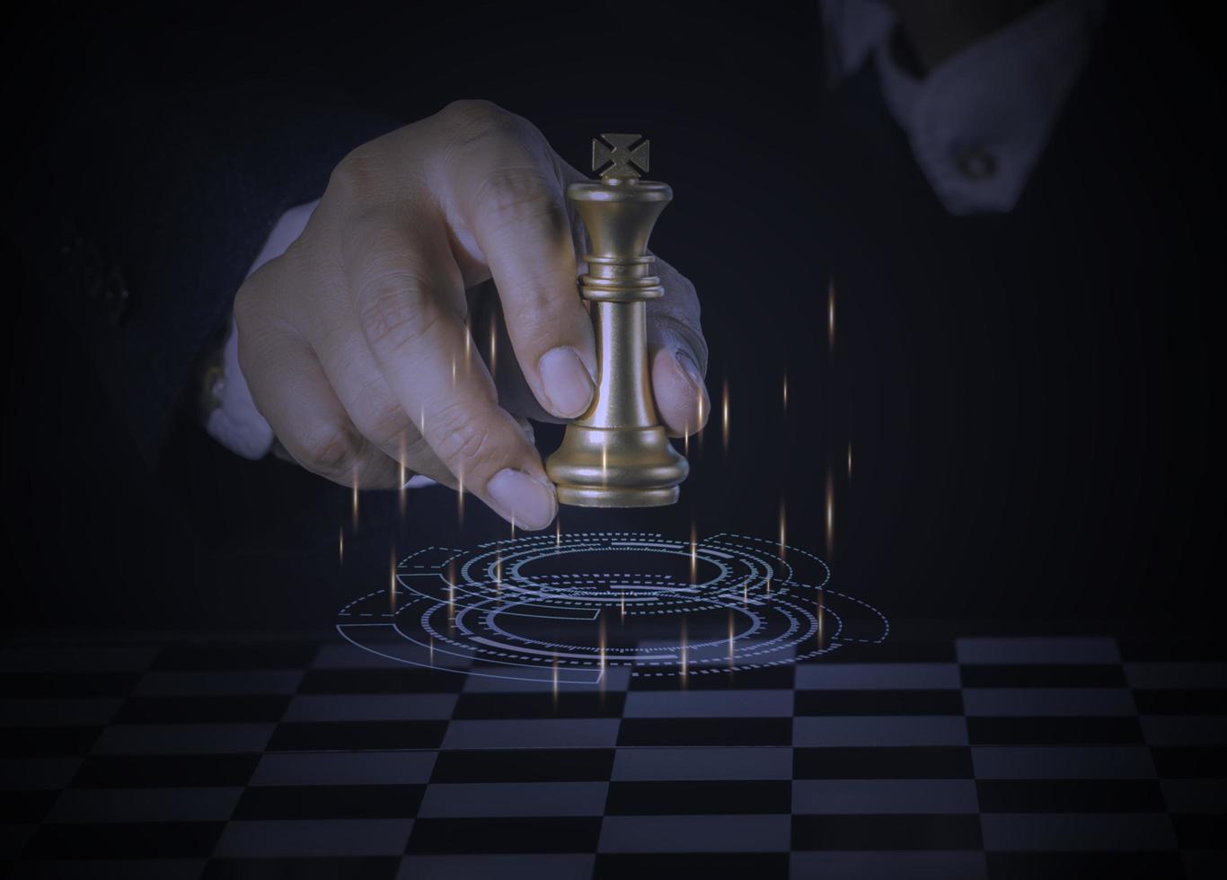 Businessman holding and throwing golden king chess to target for business winner with successfully in the competition with technology network background. Management and leadership strategy concept. photo