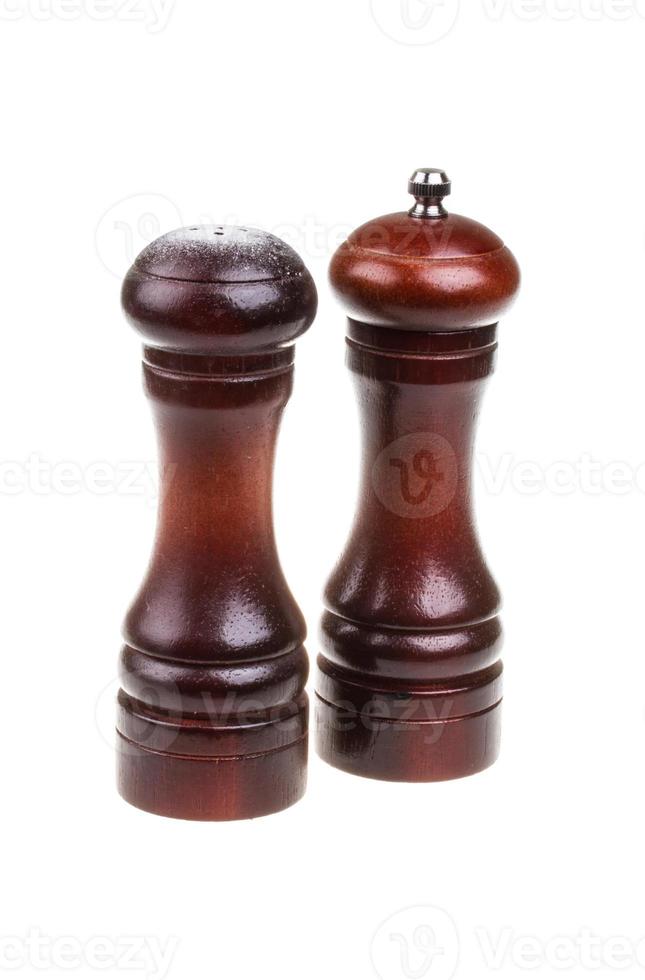 Salt and pepper shakers isolated on the white background photo