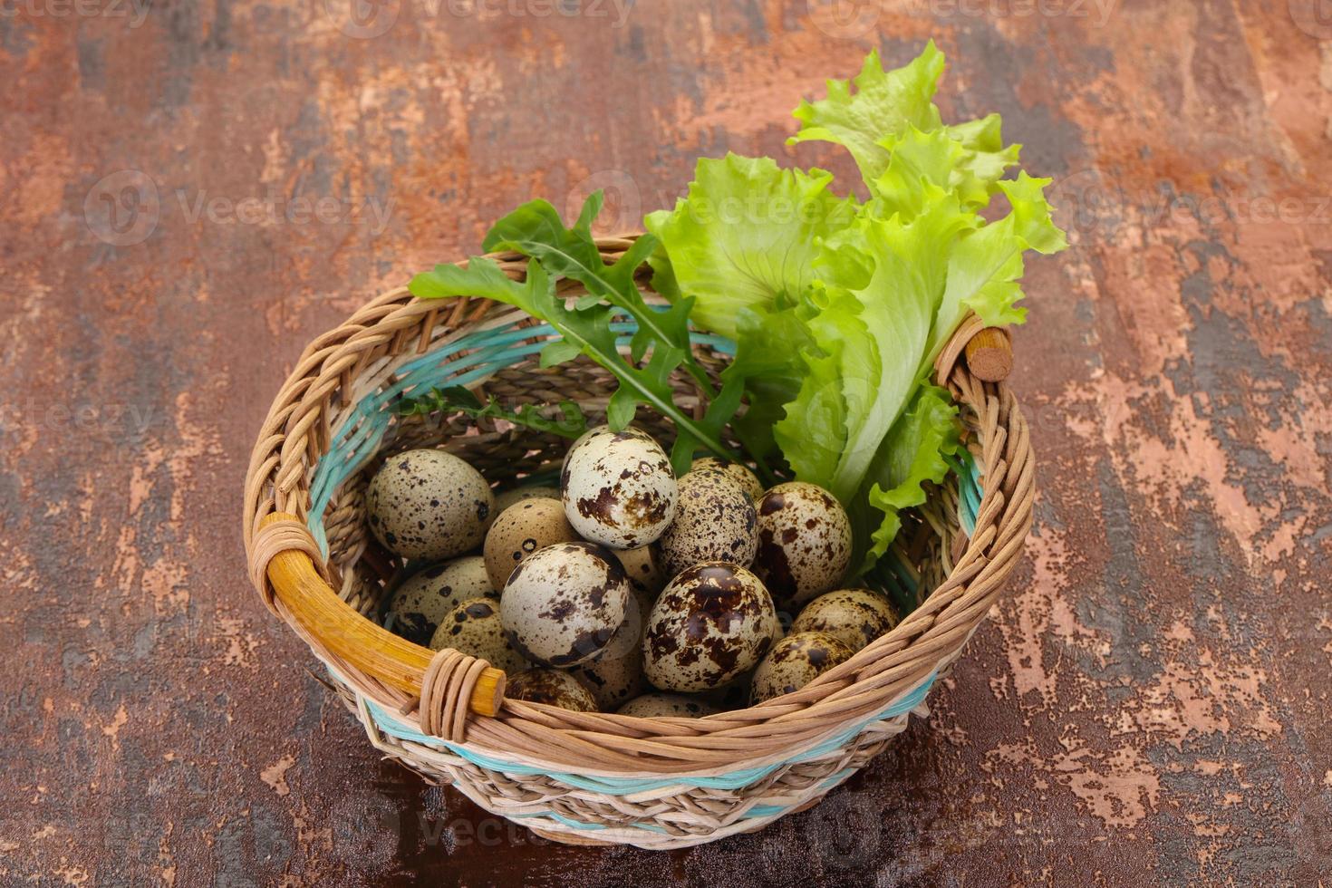 Quail eggs in the basket photo