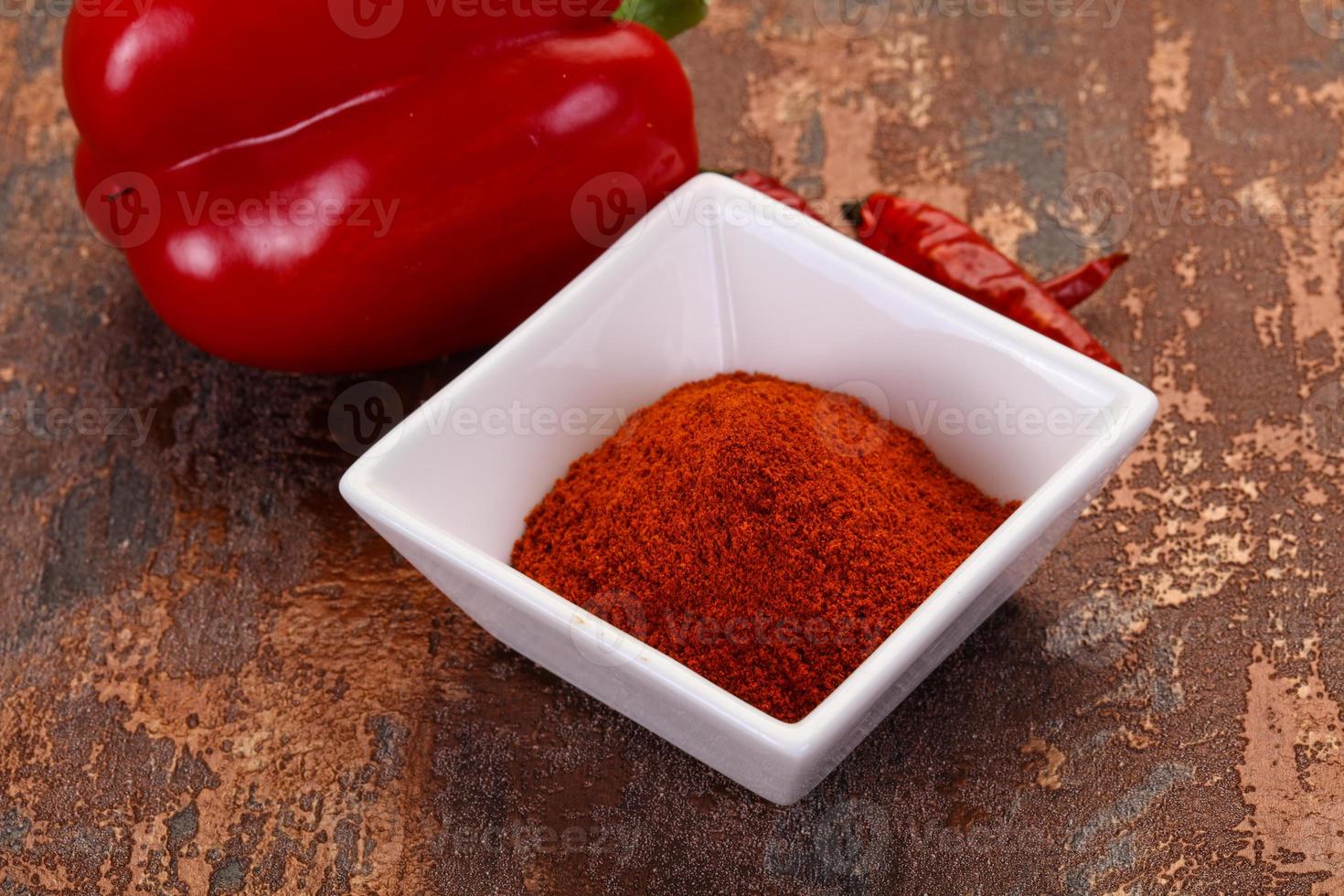 Paprika powder in the bowl photo