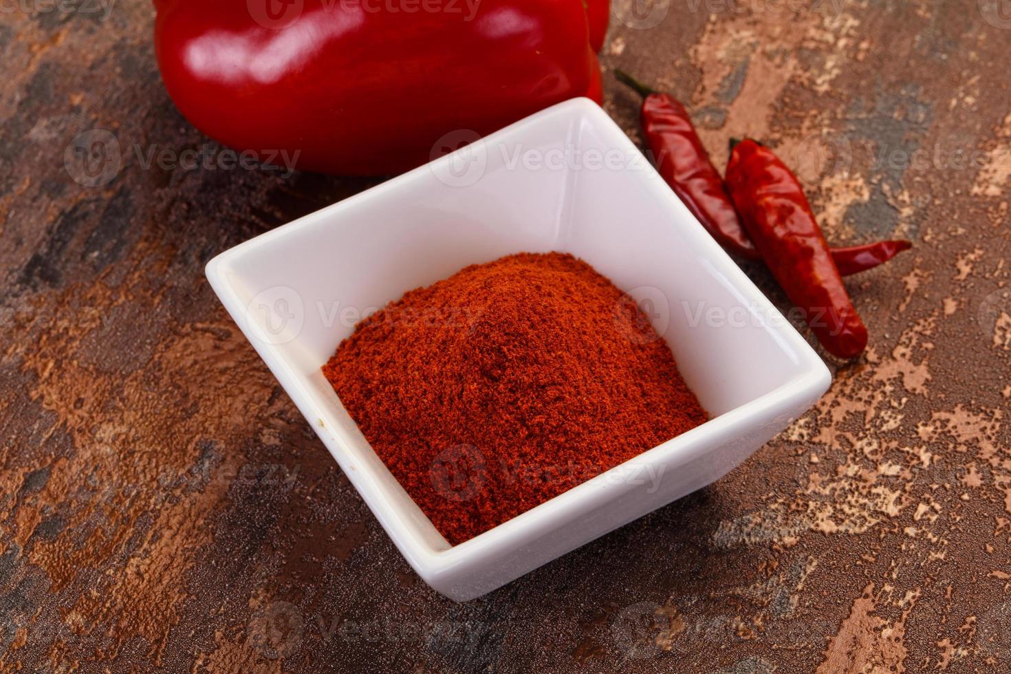 Paprika powder in the bowl photo