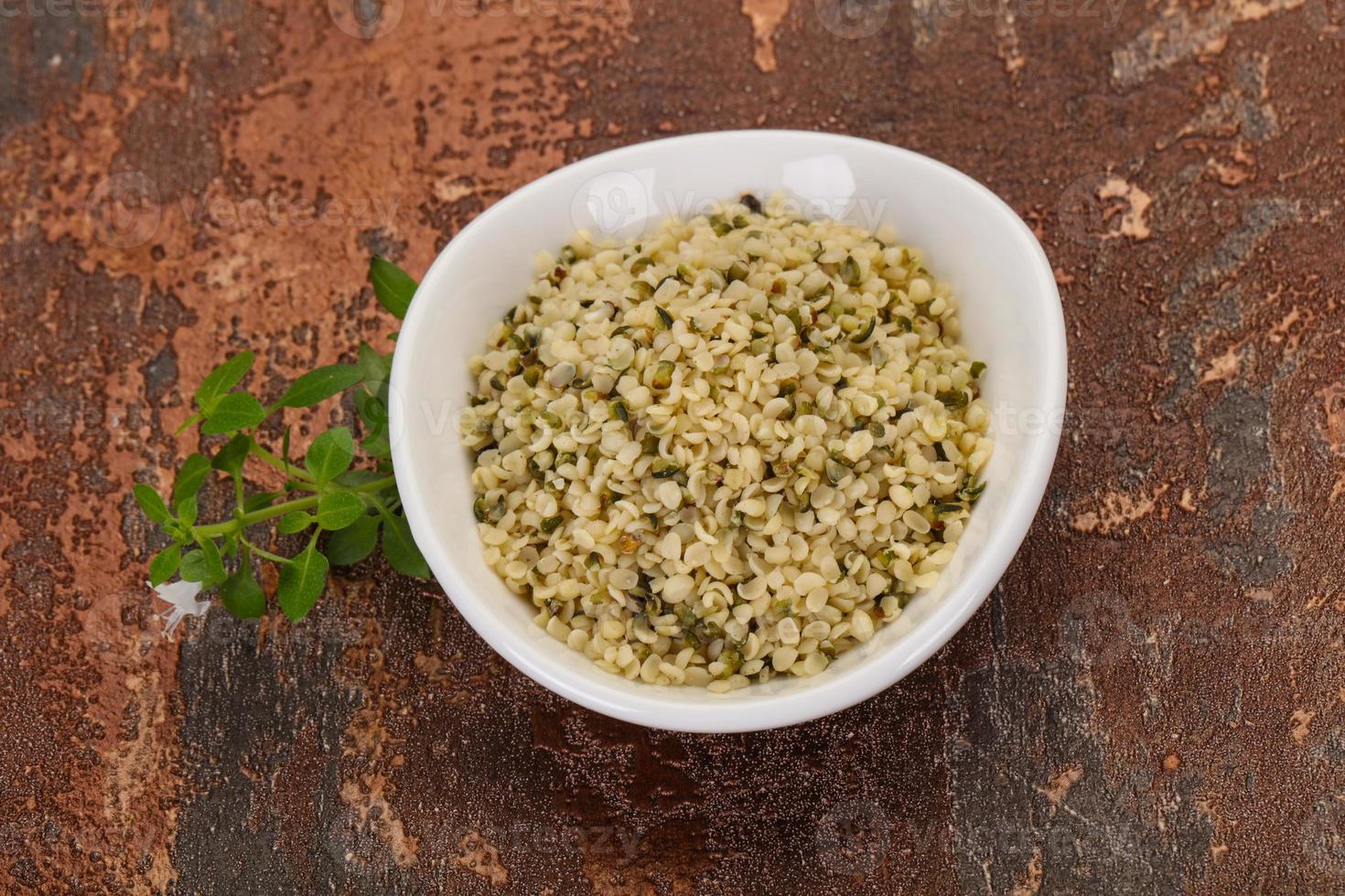 Peeled hemp seeds in the bowl photo