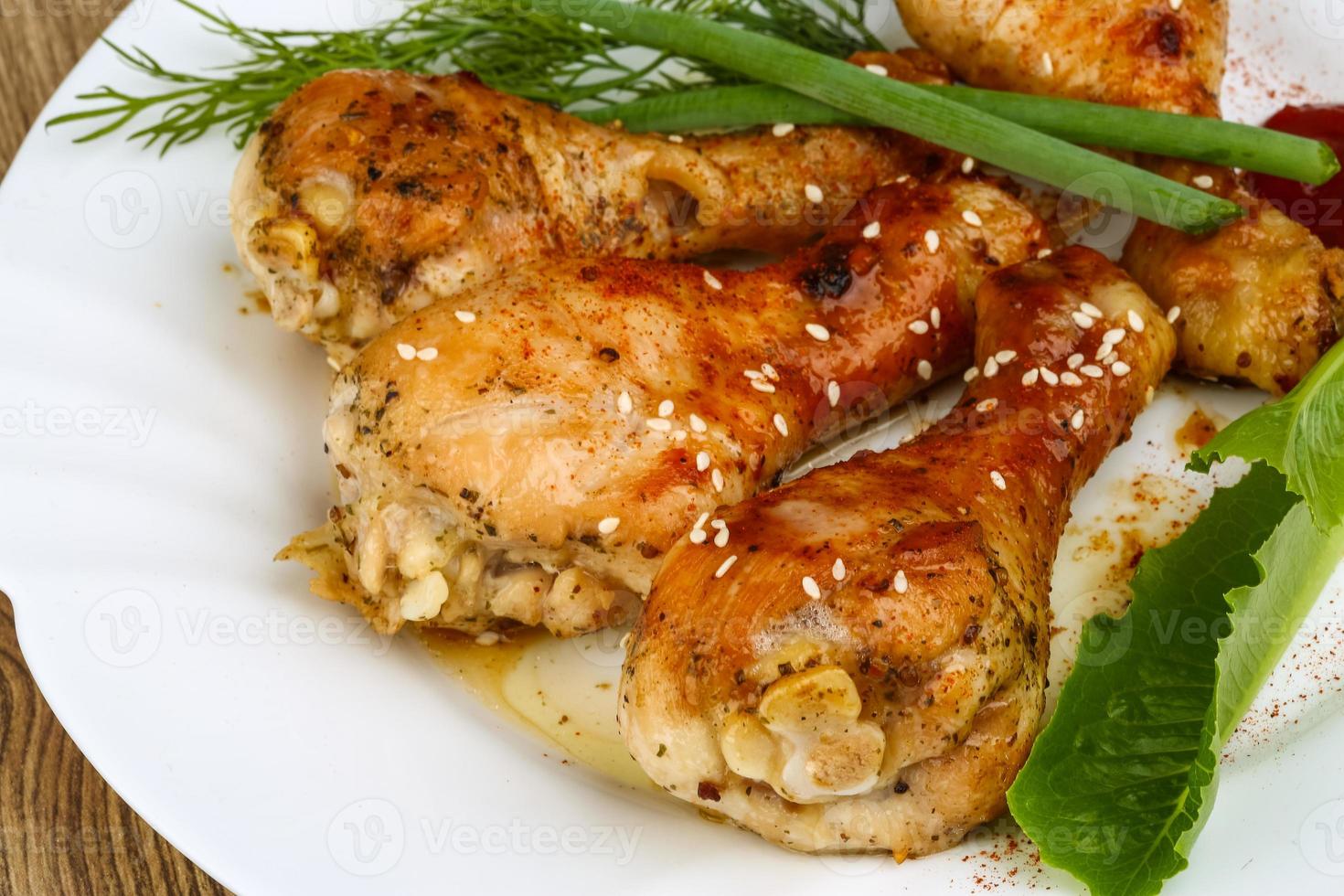 Grilled chicken legs photo