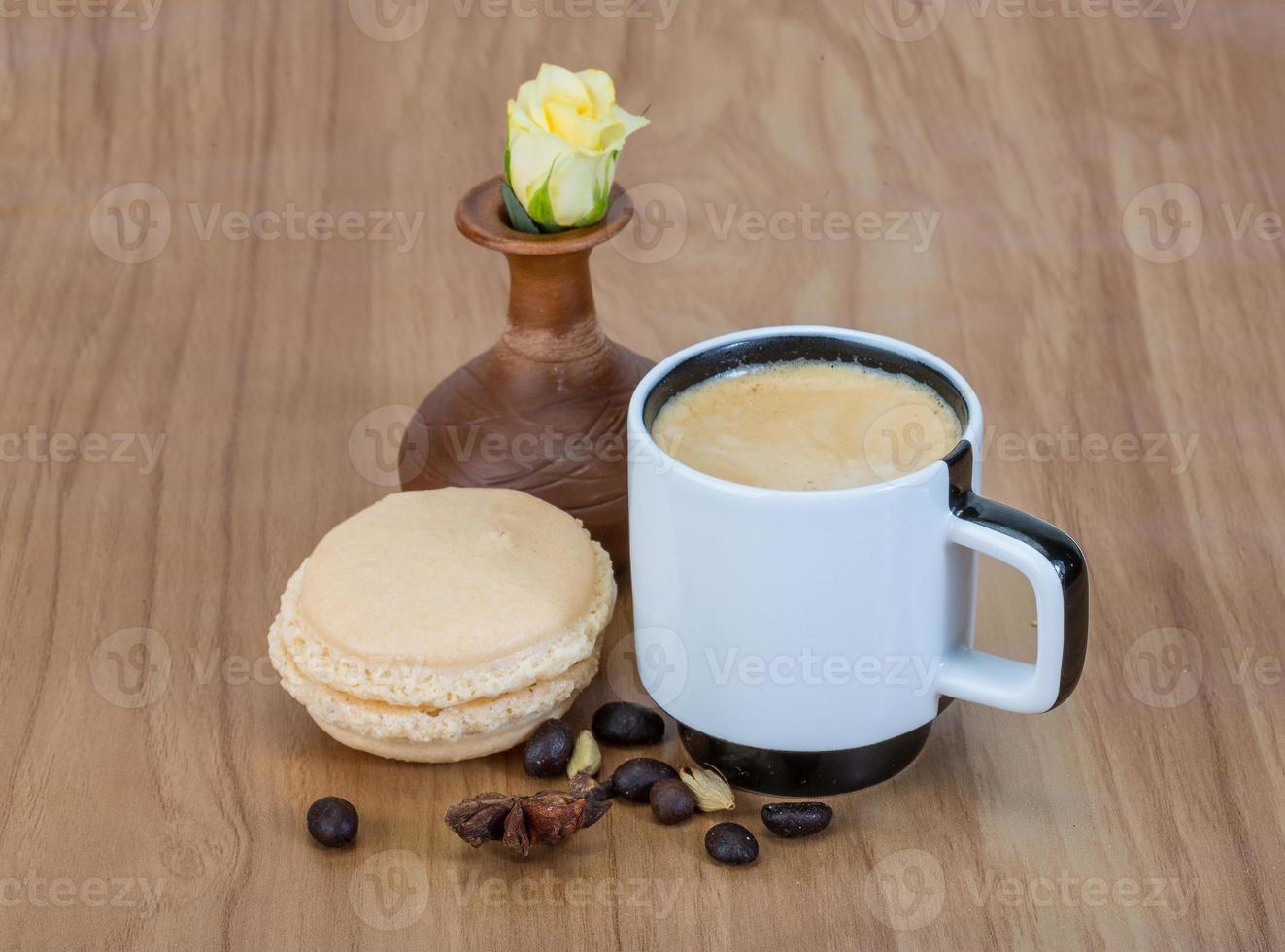 Coffee with macaroons and rose photo