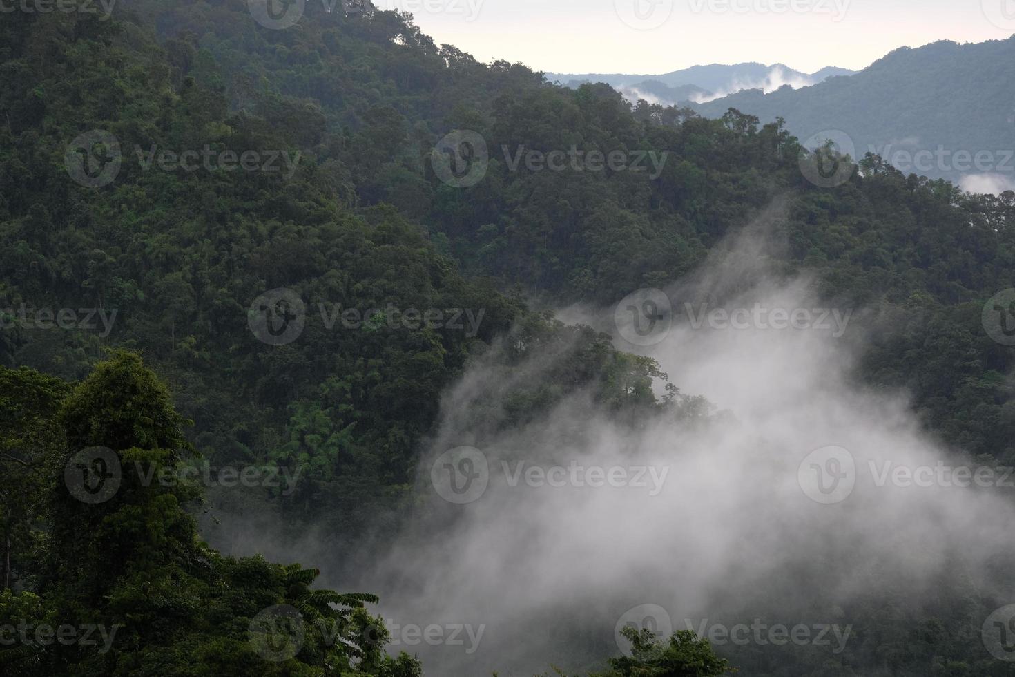 Mist among the mountains after raining photo