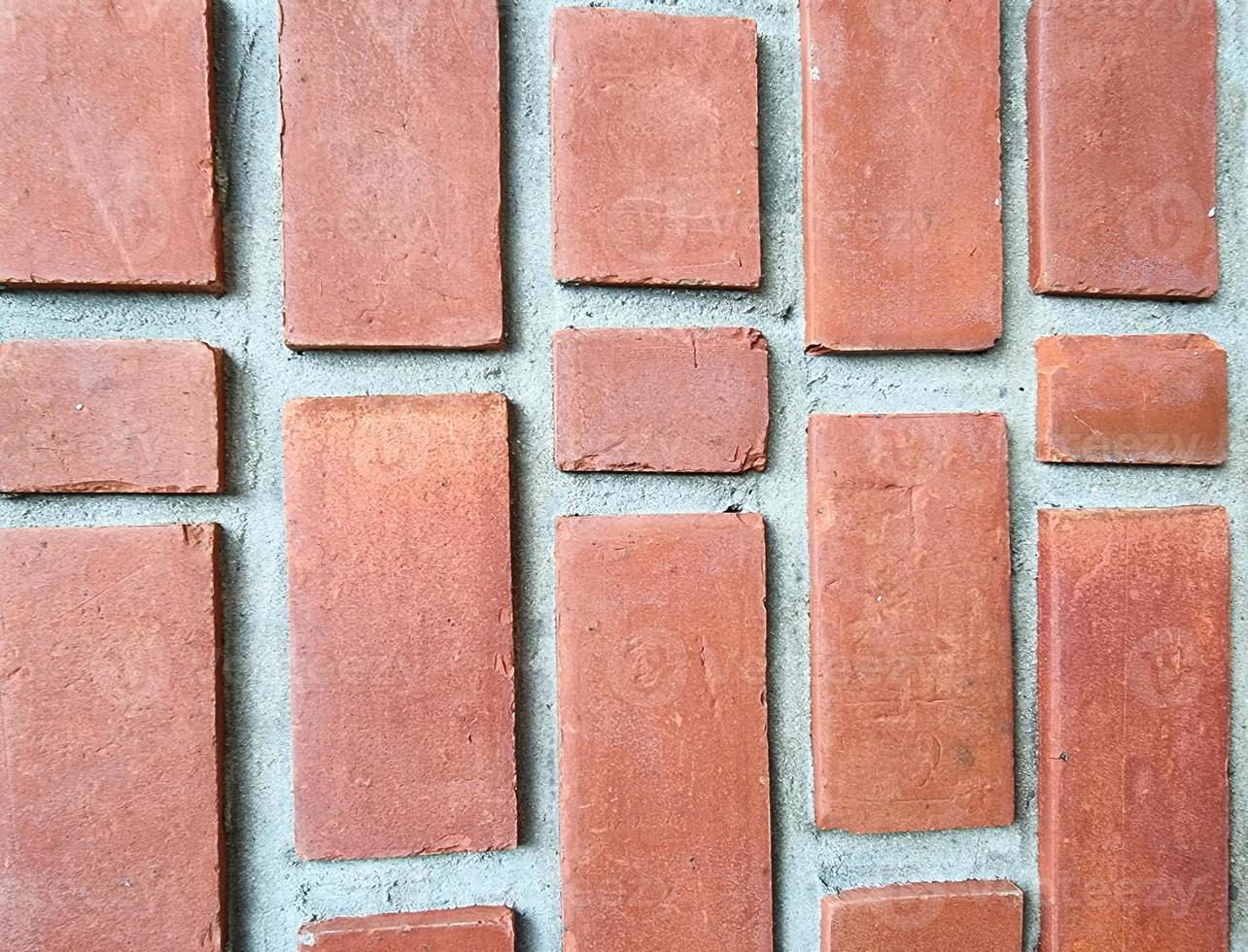 orange square brick block on cement wall textured and background. strong interiors house building vertical line image photo