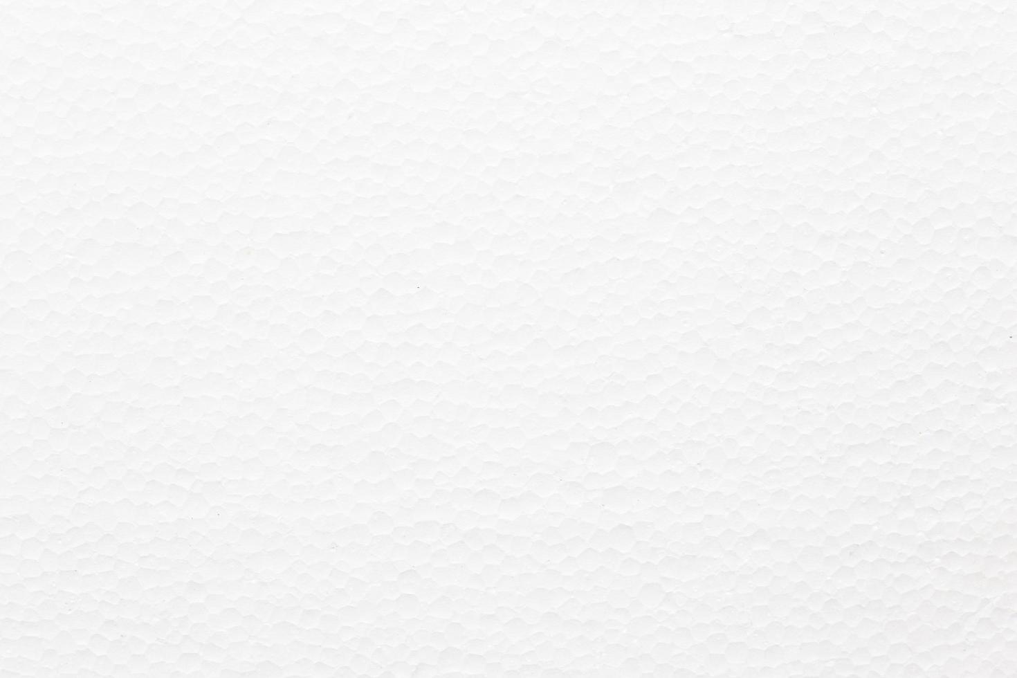 Top view of blank white styrofoam texture surface as background - rough plastic bubble  pattern. photo