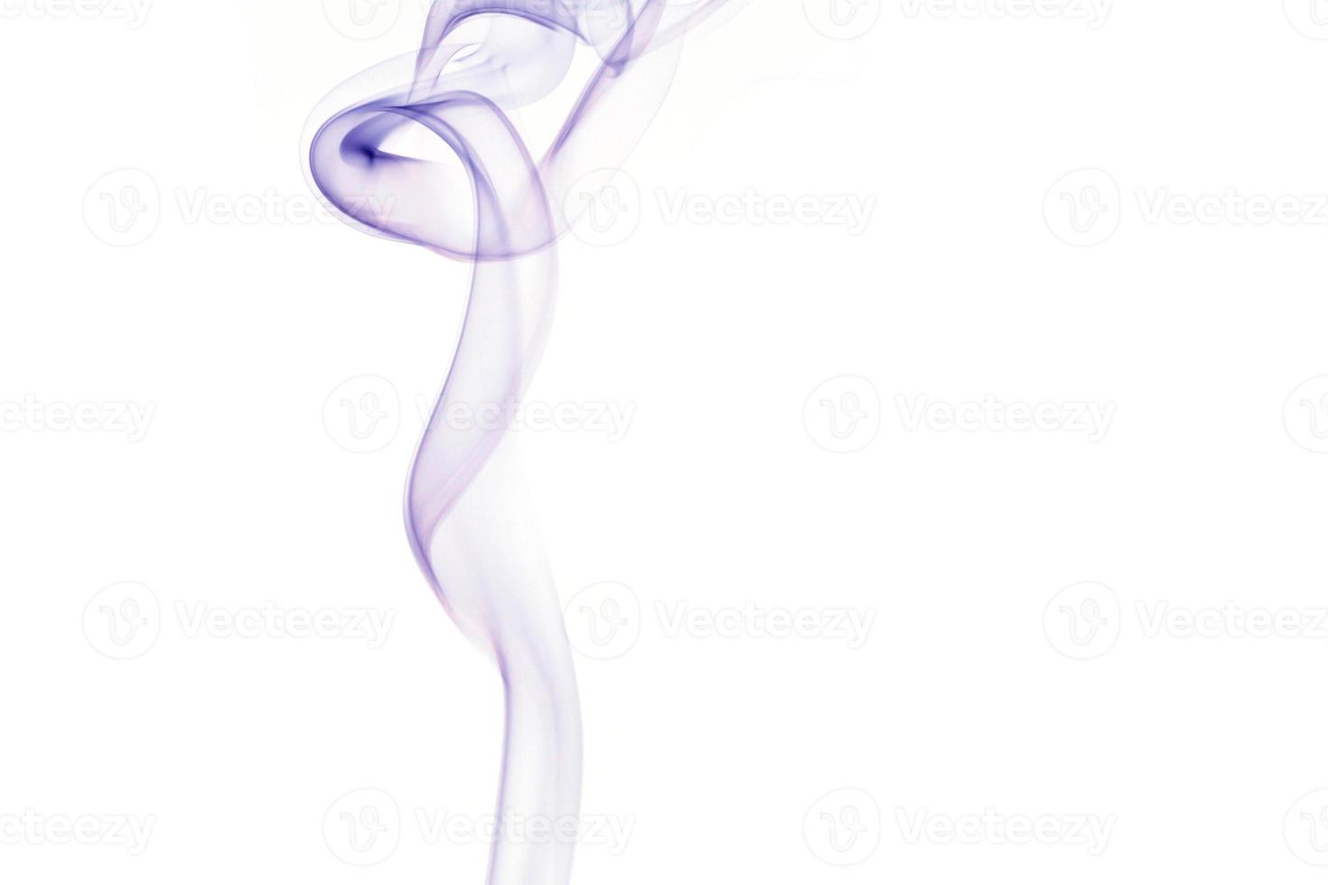 Purple smoke on white background photo