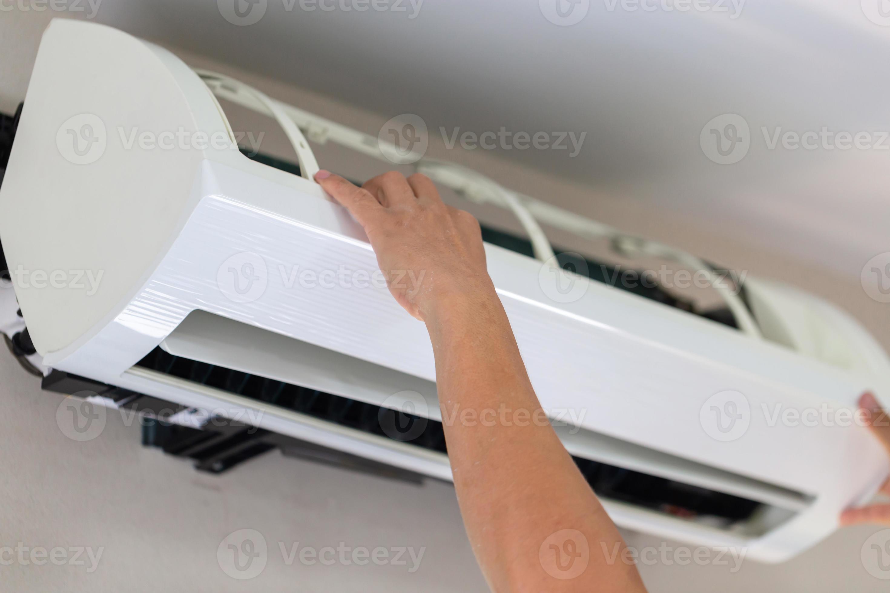 Air Conditioning Repair, Repairman ixing air conditioning system, Male