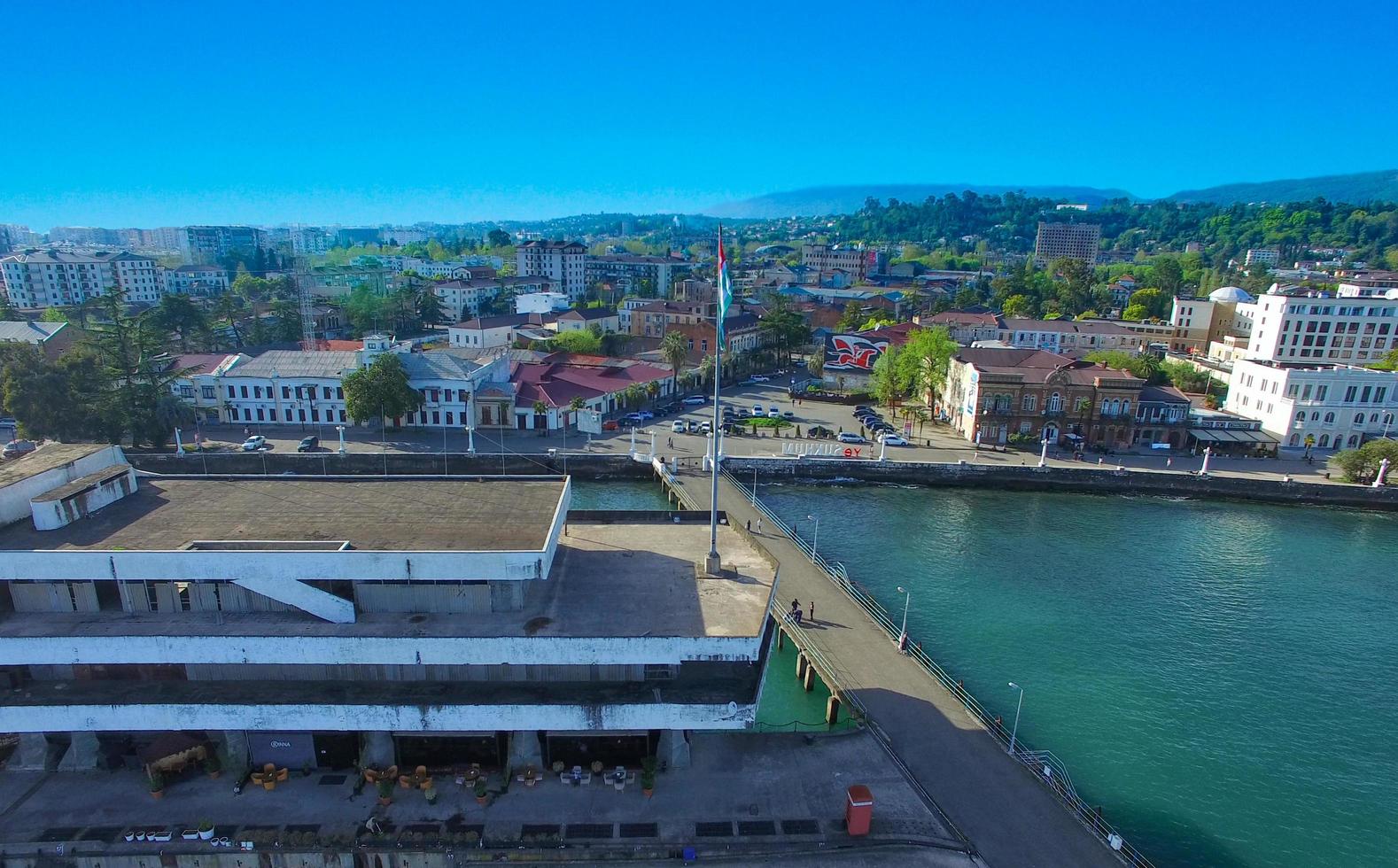 Sukhumi, Abkhazia - July 30, 2019- Aerial view of the cityscape overlooking the maritime station. photo