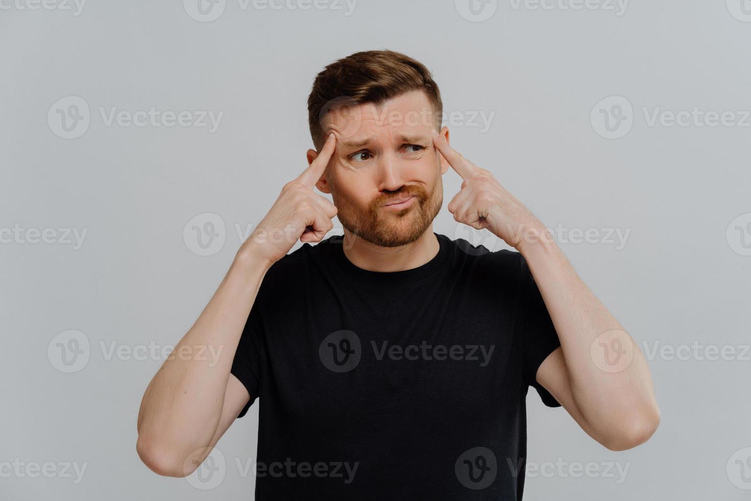 Man trying to make decision or find solution photo