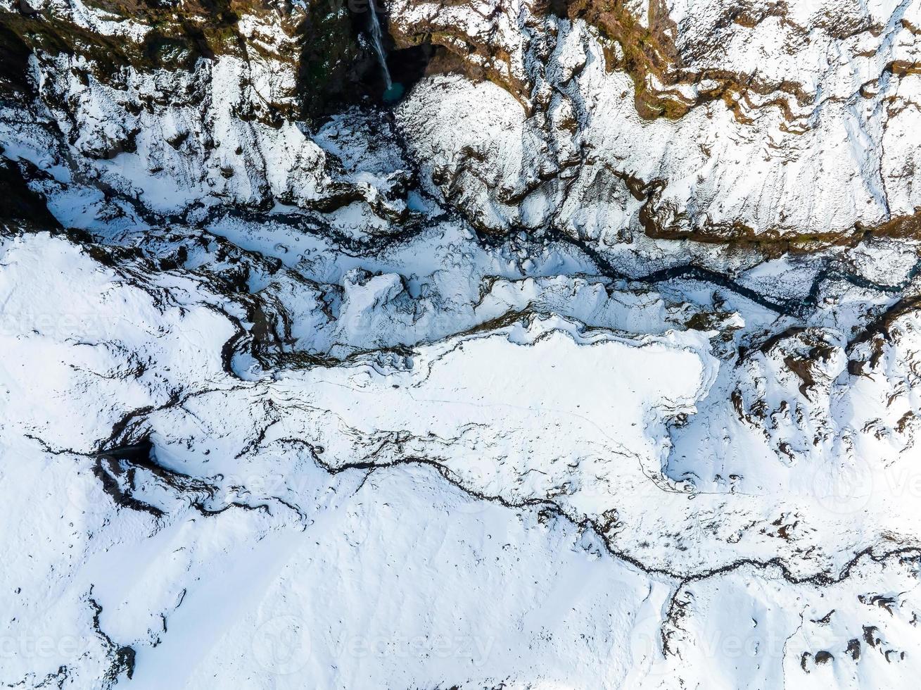 Aerial view of the glaciers and snowy mountains in Iceland. photo