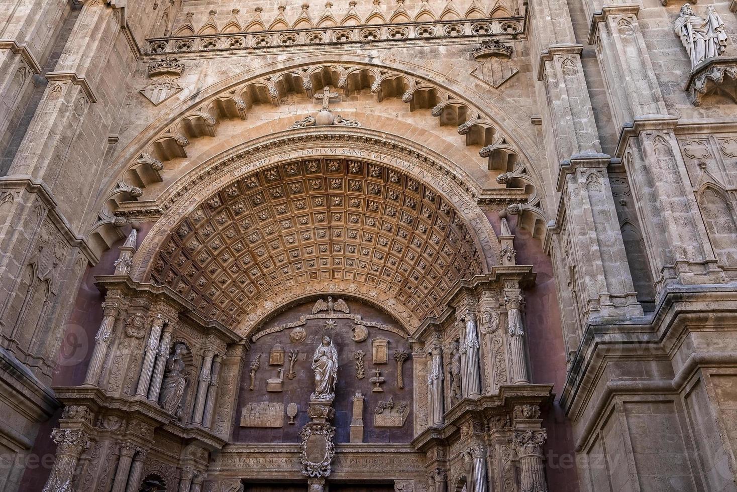 Low angle view of beautiful gothic style La Seu cathedral entrance with design photo