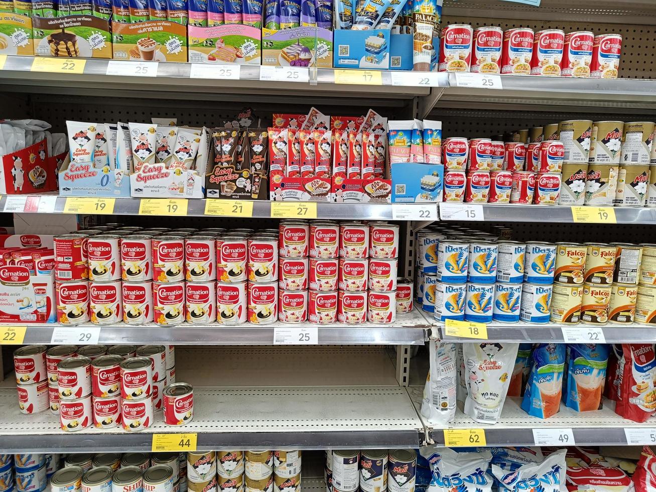Nonthaburi, Thailand - May 25, 2022 sweetened condensed milk on the shelf in the supermarket photo