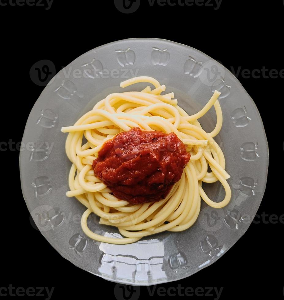 Spaghetti noodles tomato sauce on plate, Top view, with clipping path photo