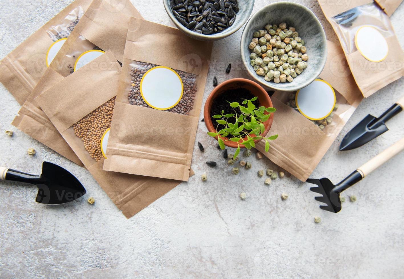 Microgreen seeds in paper bags and equipment for sowing microgreens. photo