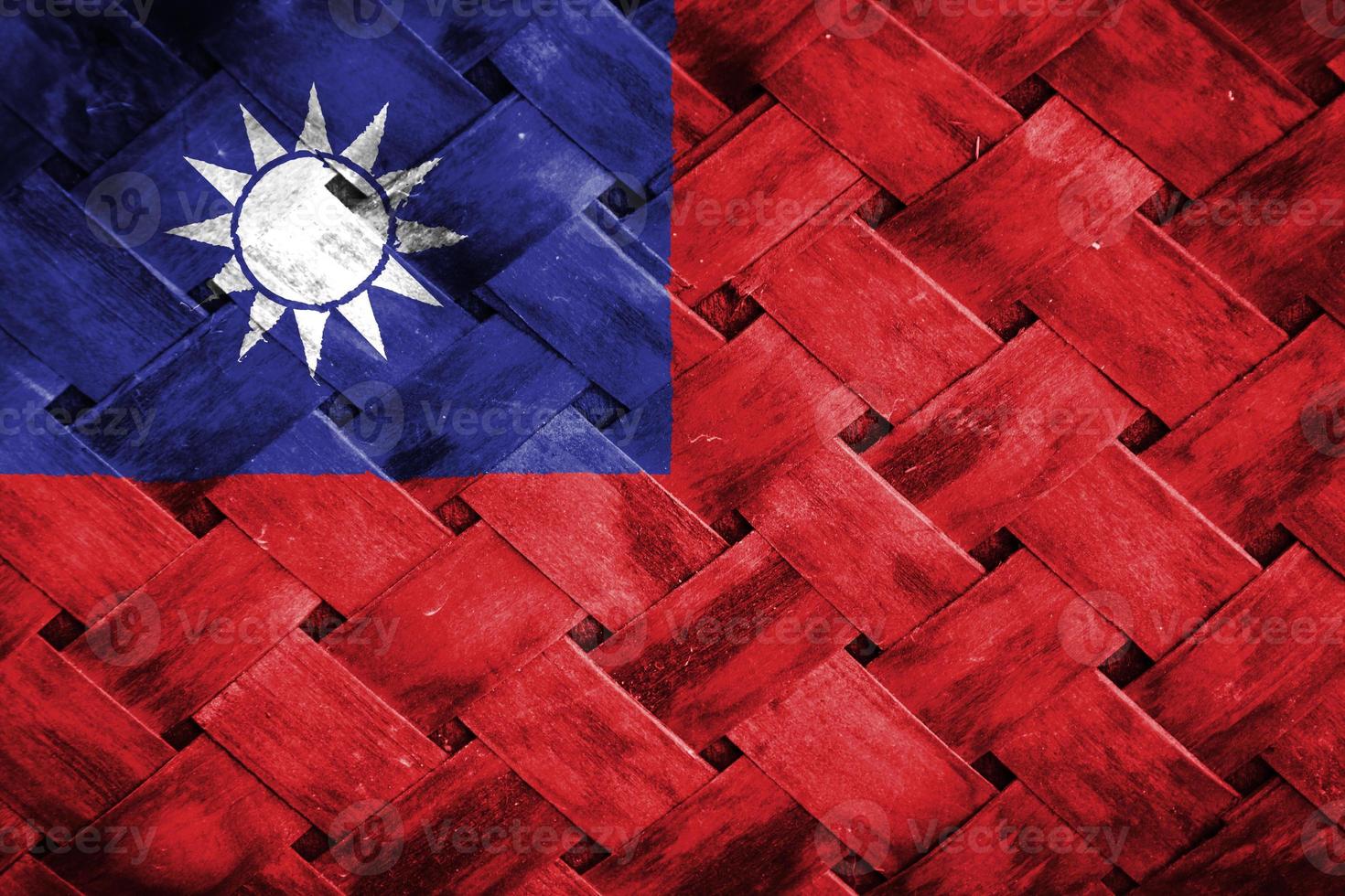 taiwan flag screen on wicker wood background photo