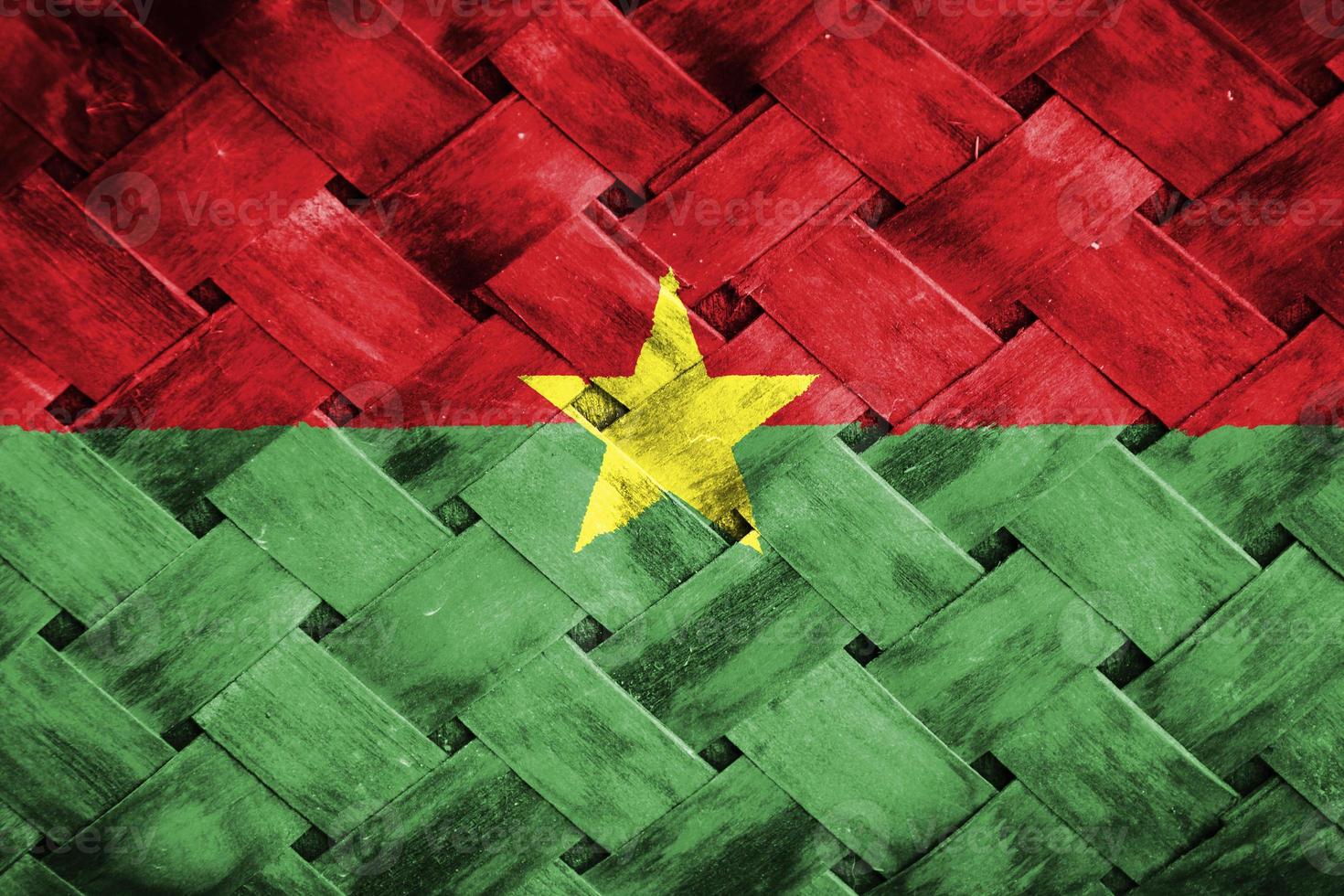 burkina flag screen on wicker wood background photo