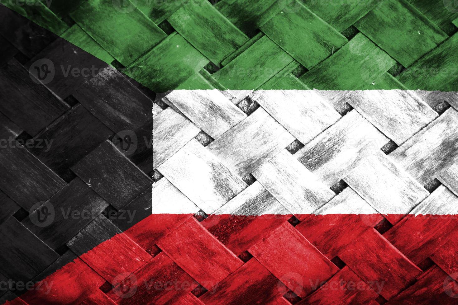 kuwait flag screen on wicker wood background photo