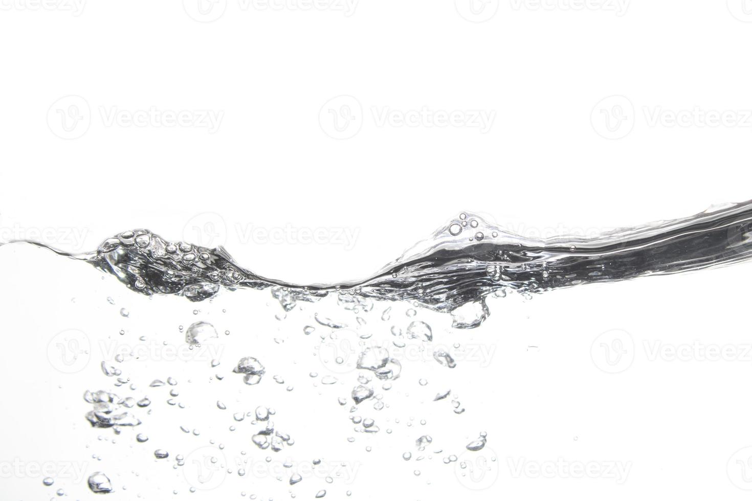 Splashing water surface with a white background photo