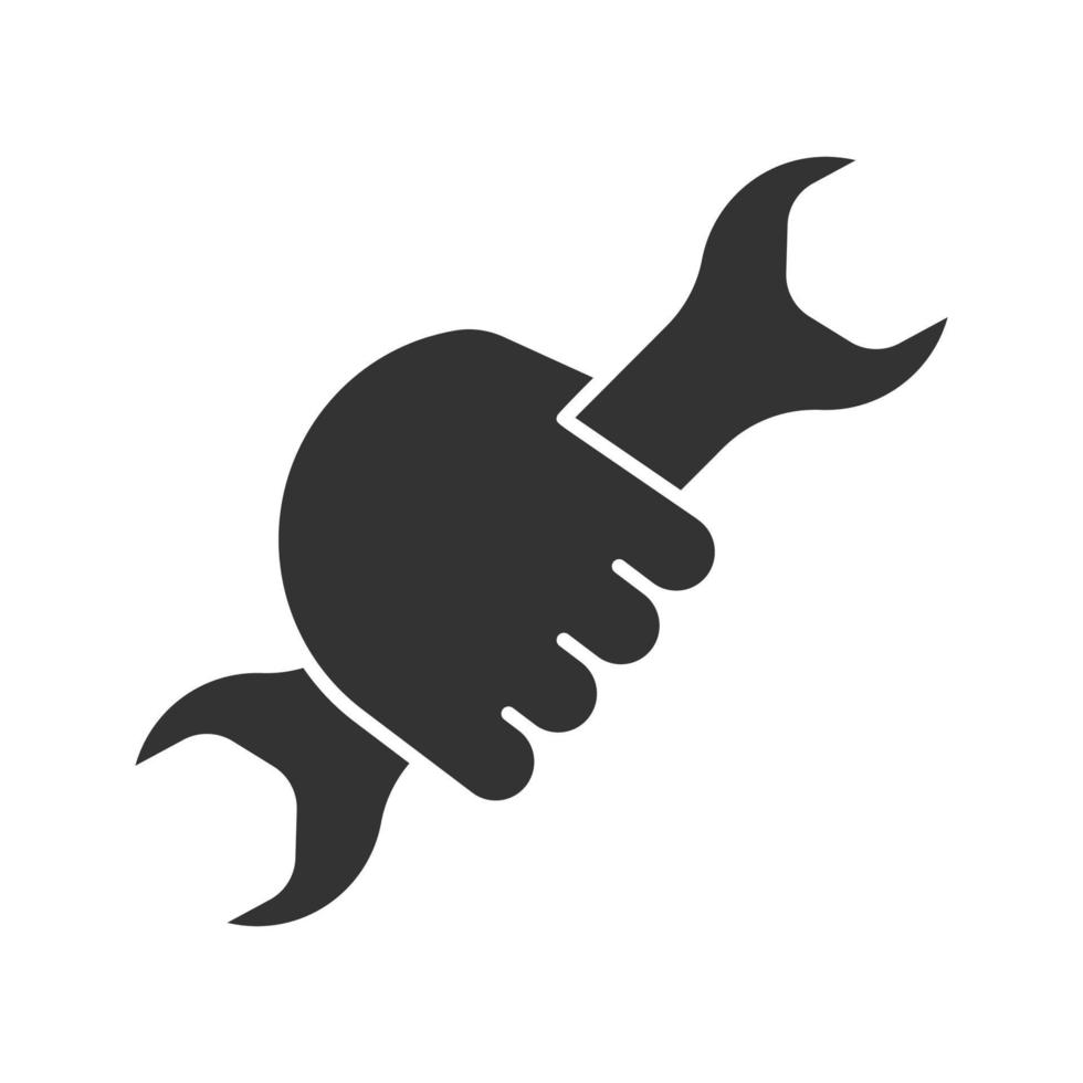 Hand holding wrench glyph icon. Silhouette symbol. Double open ended spanner. Negative space. Vector isolated illustration