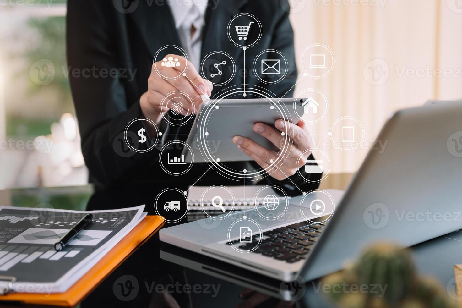 sinesswoman hand working digital marketing media in virtual screen with mobile phone and modern compute with VR icon photo