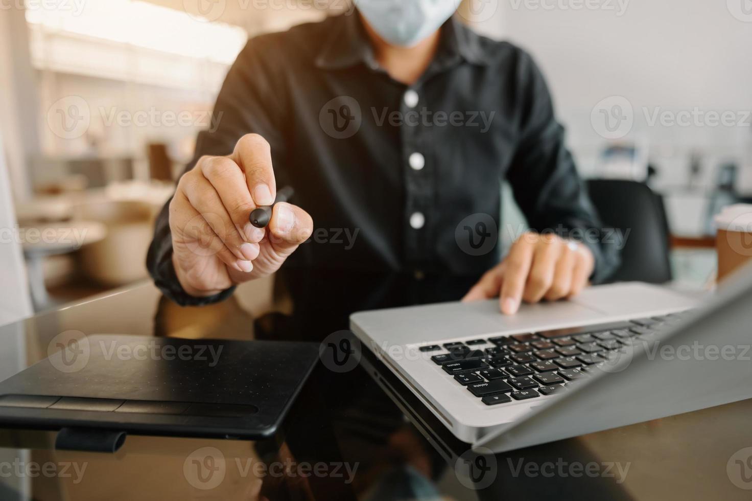business documents on office table with smart phone and digital tablet and graph financial photo