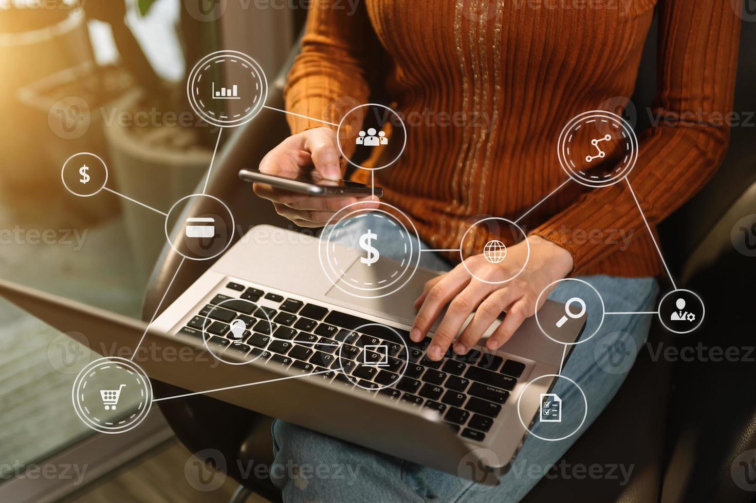Social media and Marketing virtual icons screen concept.close up of businesswoman typing keyboard with laptop computer photo