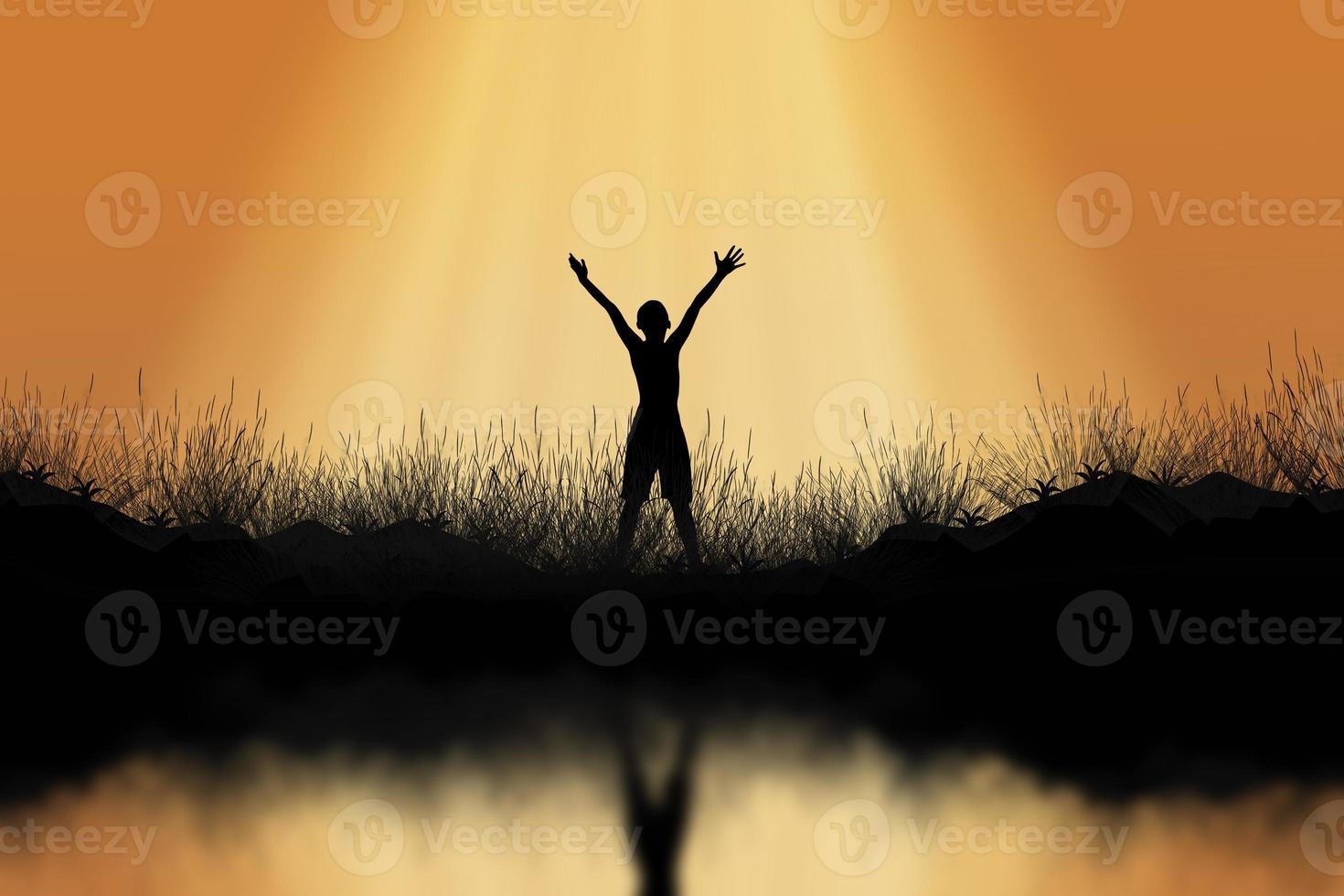 Silhouette of man standing on the mountain raise exposure. photo