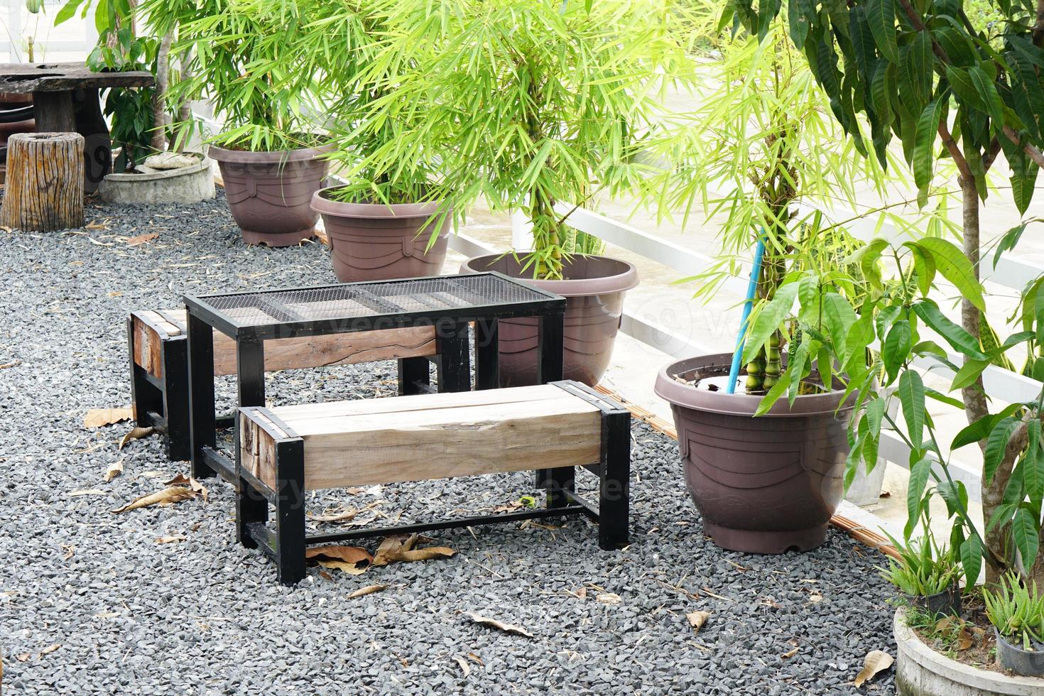 Table for sitting in the garden . Used for dining, reading. photo