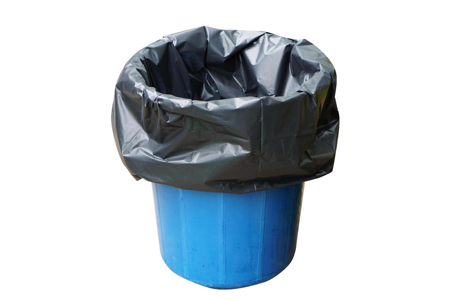 Garbage bins are worn with black bags. on a white background photo