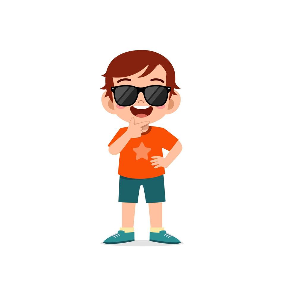 lindo niño pequeño muestra genial y con gafas negras pose expresión vector