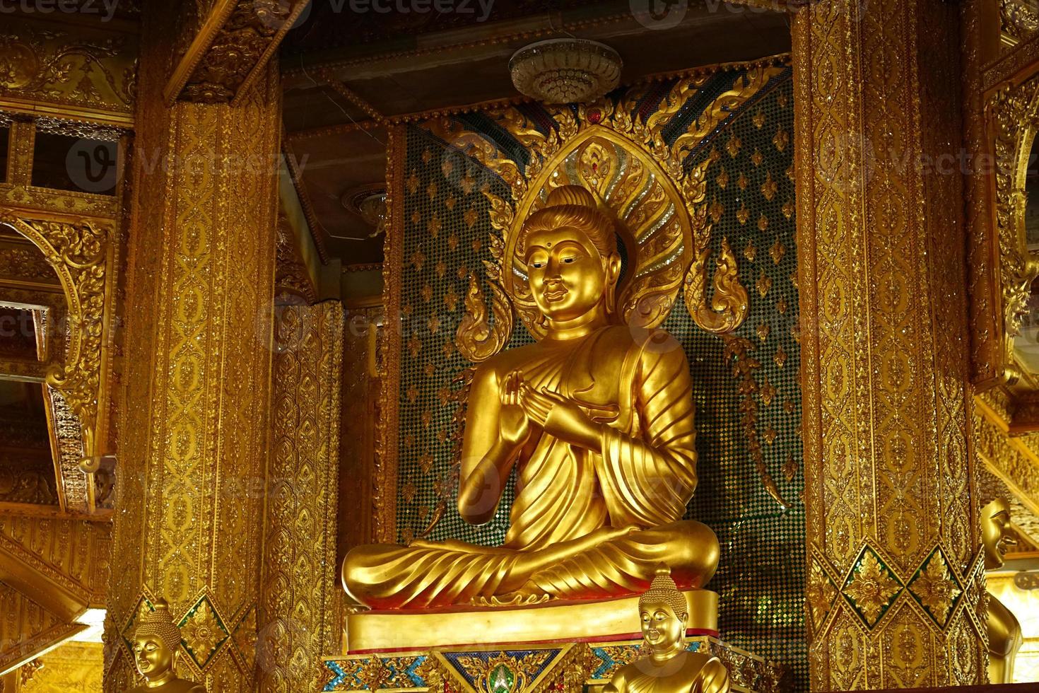 golden buddha in temple.Makha Bucha Day.Vesak Day.Asanha Bucha.Buddhist Lent. photo