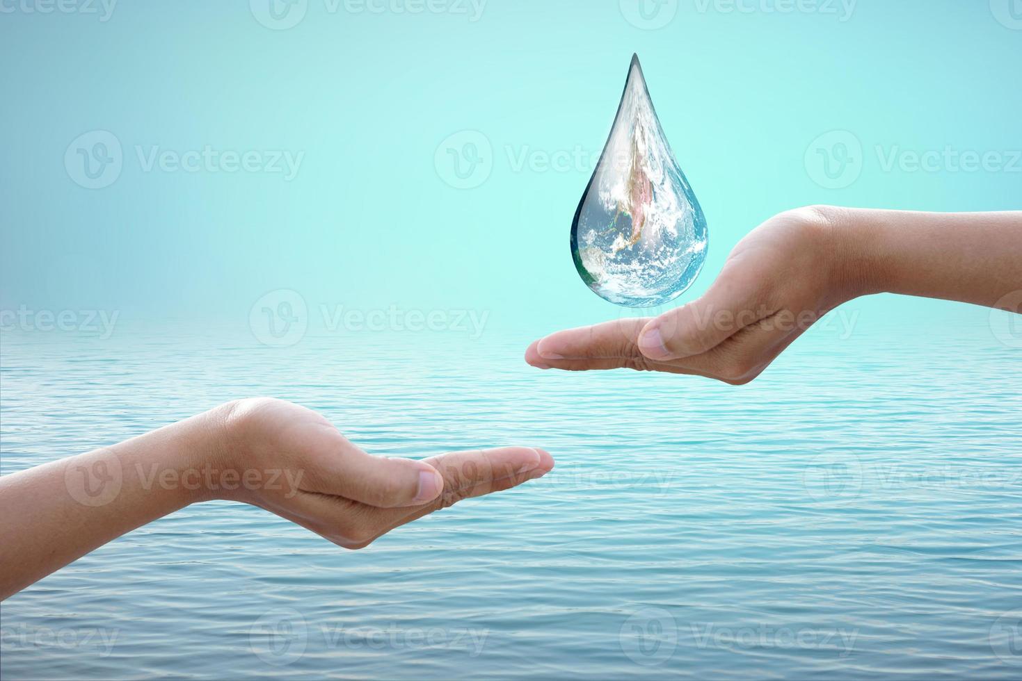 World Water Day. Human hands give water. photo